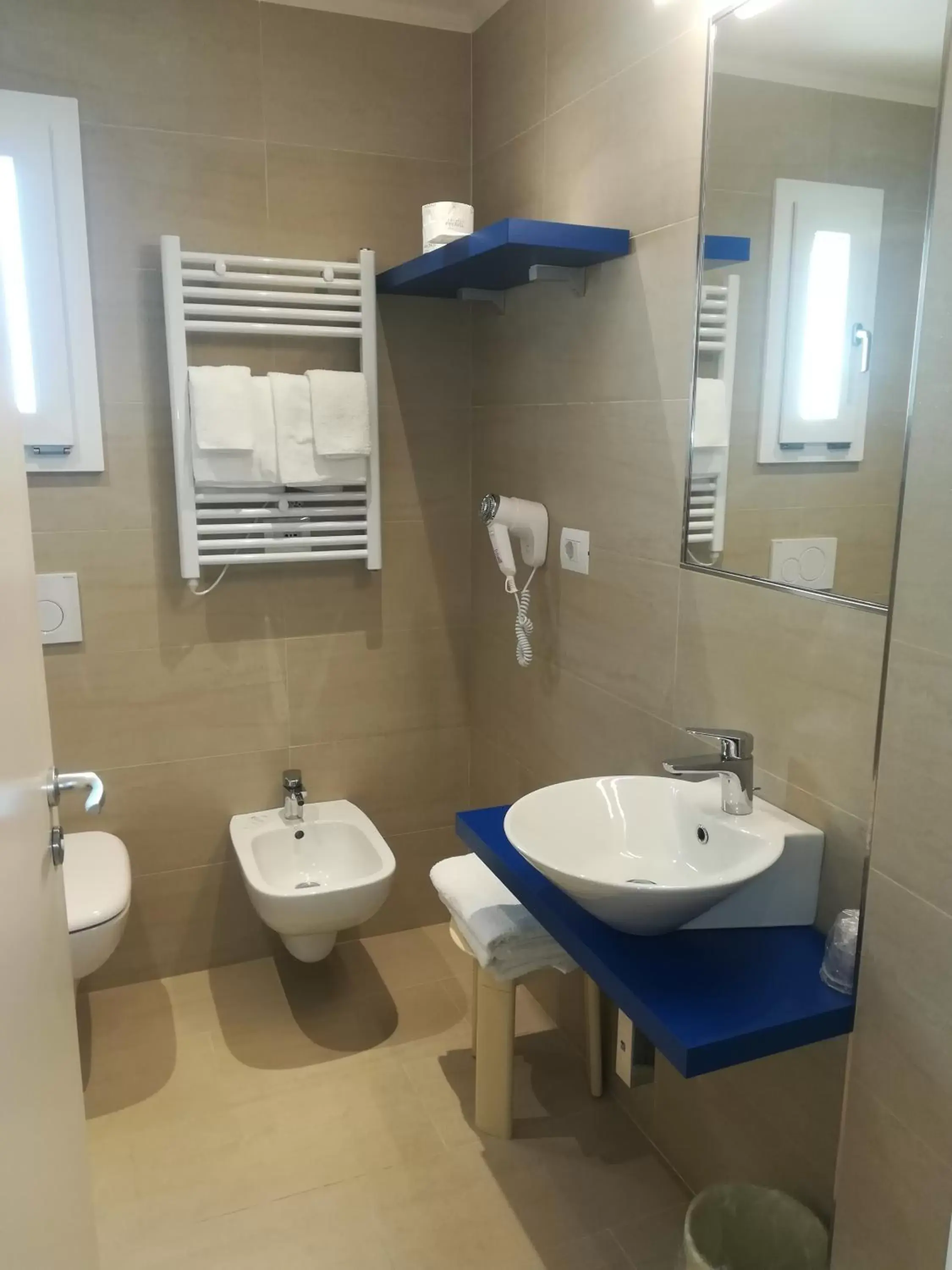 Toilet, Bathroom in Roma Hotel