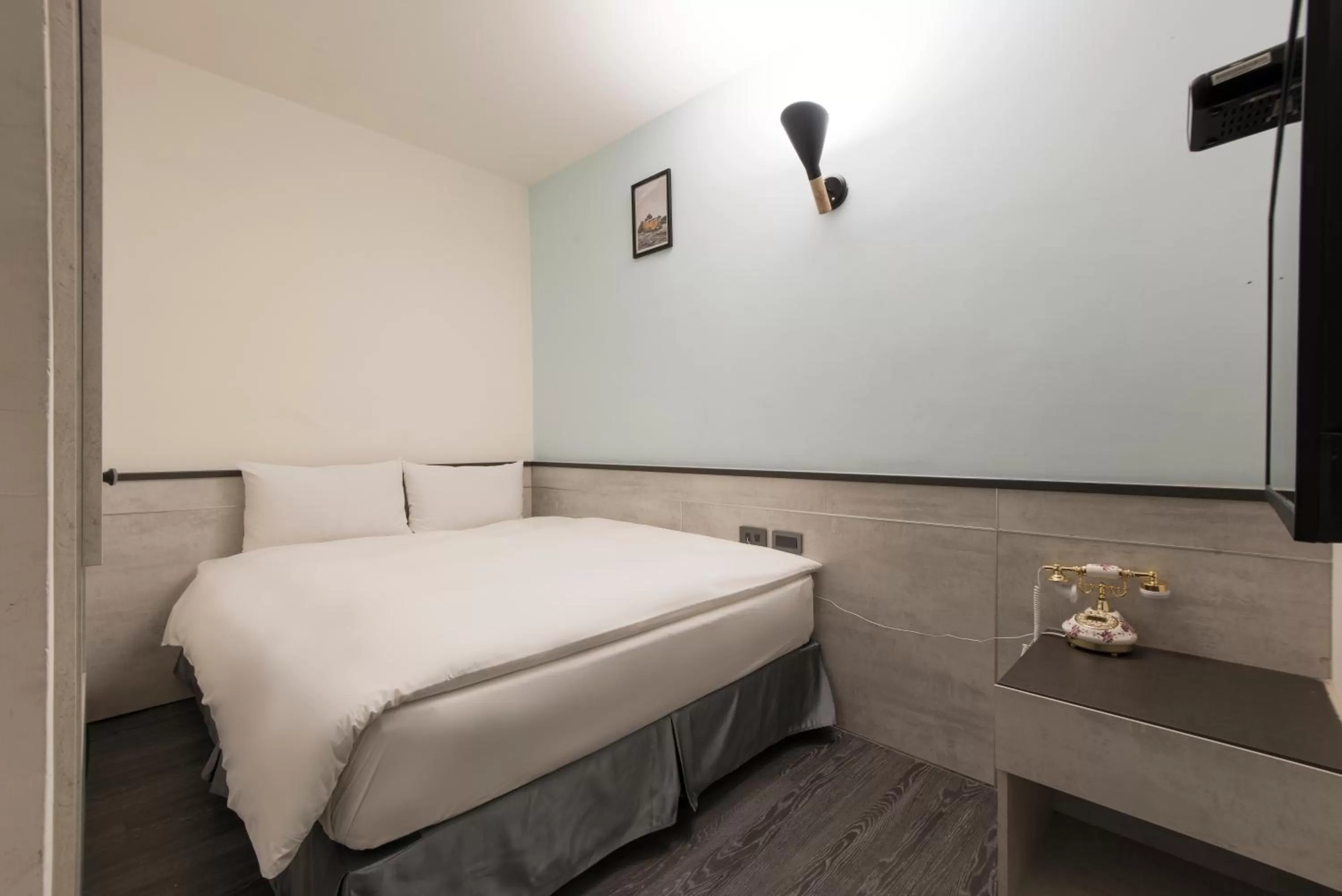 Bed in Raise Hotel Taichung