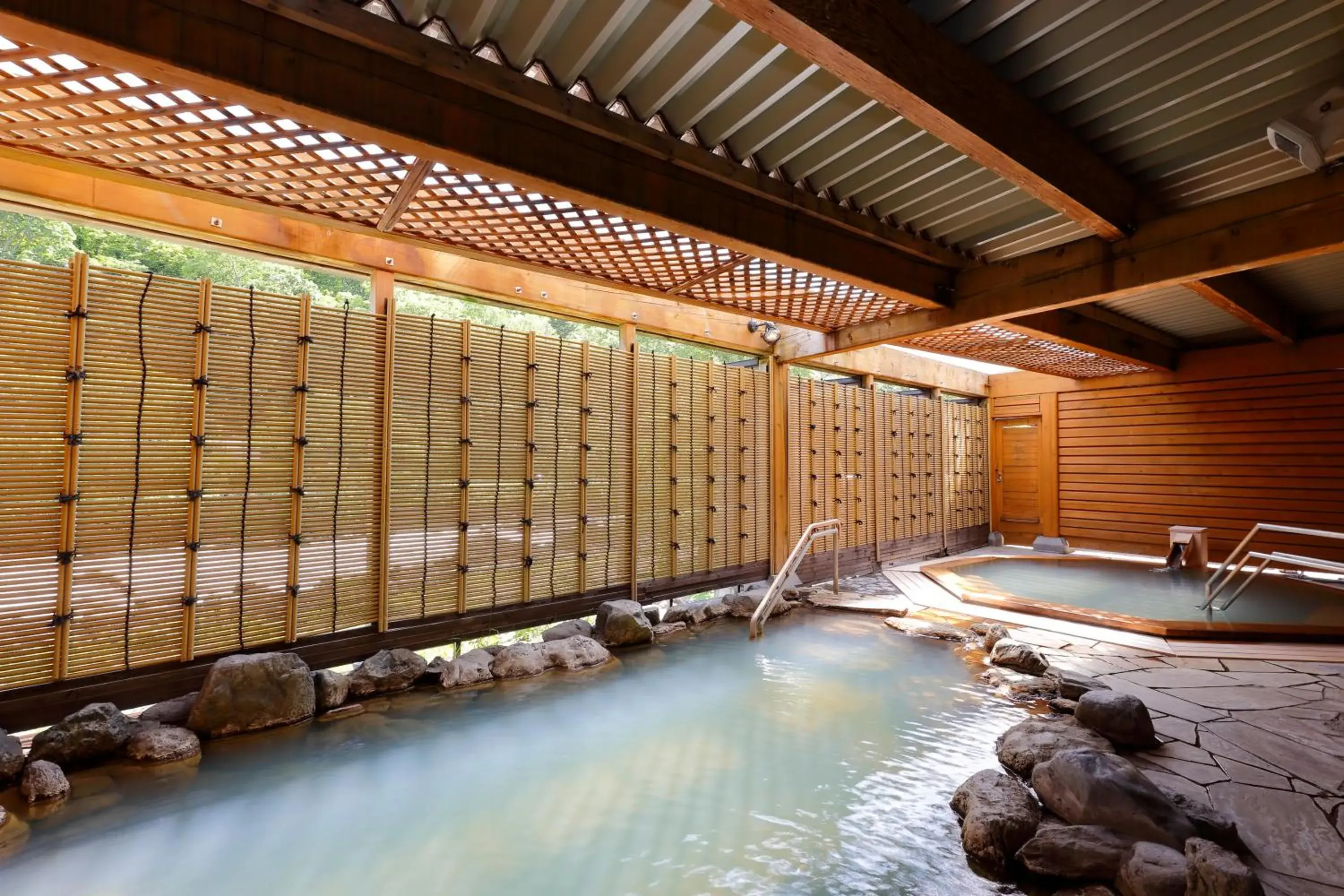 Hot Spring Bath, Swimming Pool in Sounkyo Kanko Hotel
