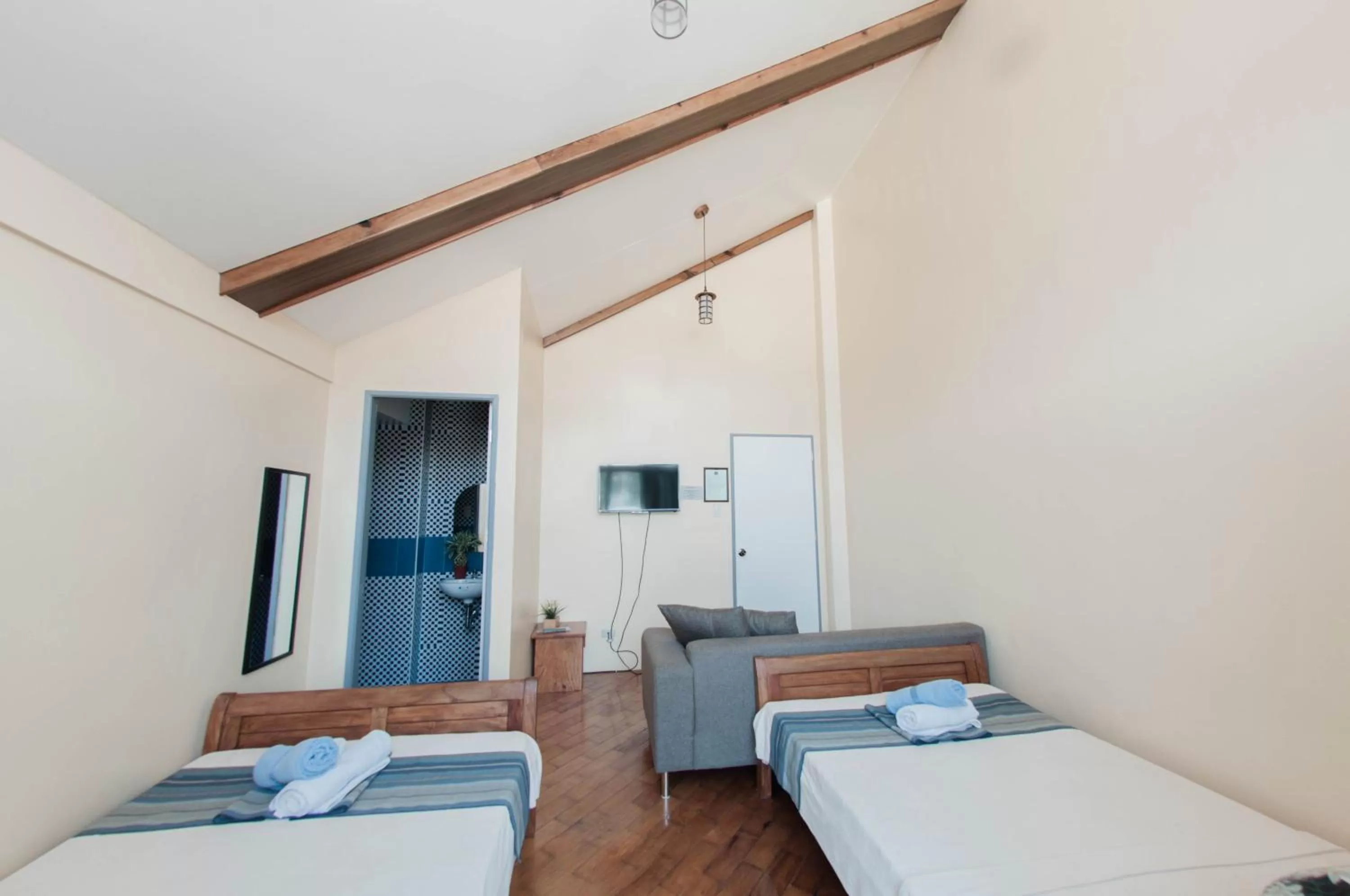 Bed in The Half House by Elmar Cabin