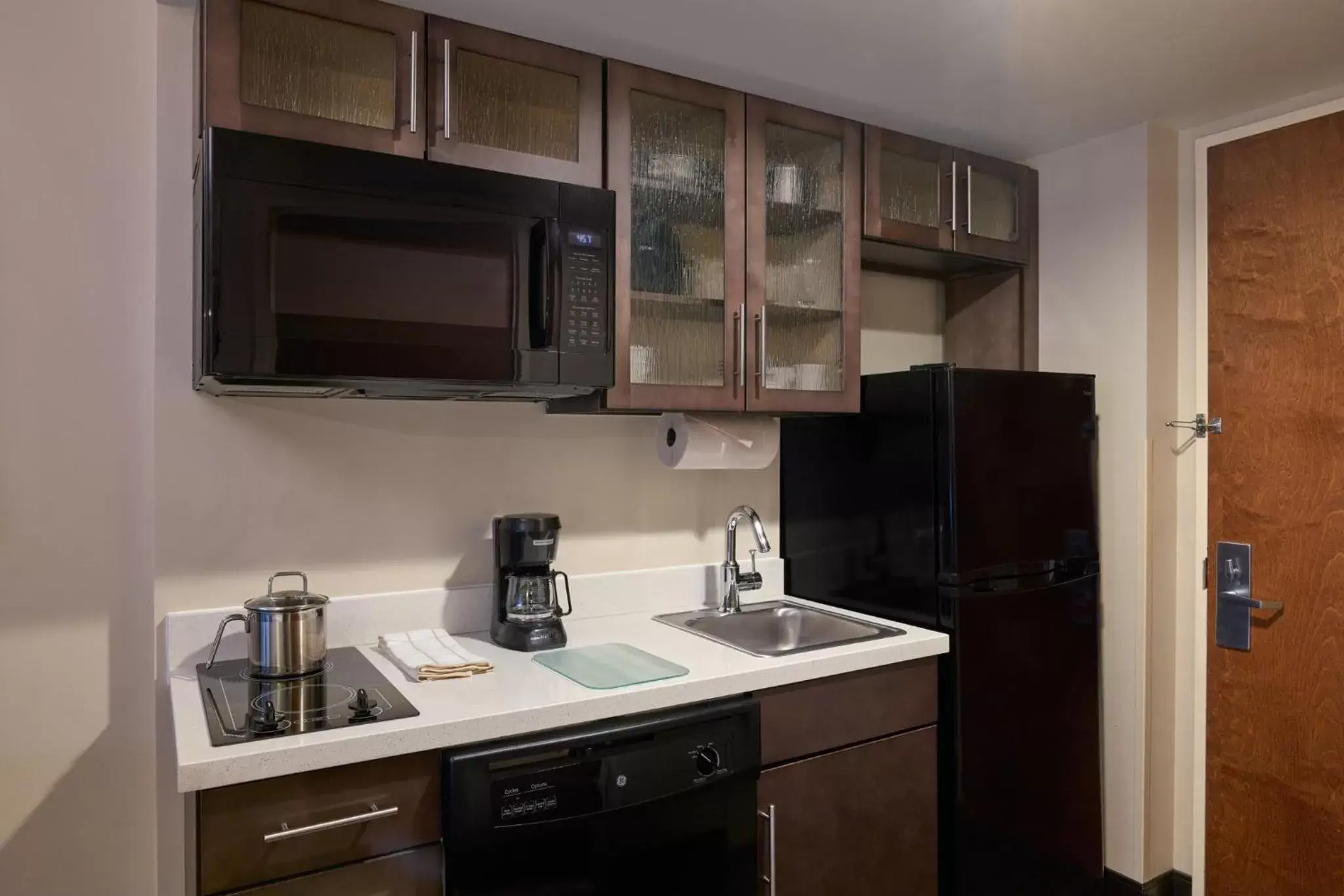 Photo of the whole room, Kitchen/Kitchenette in Candlewood Suites NYC -Times Square, an IHG Hotel