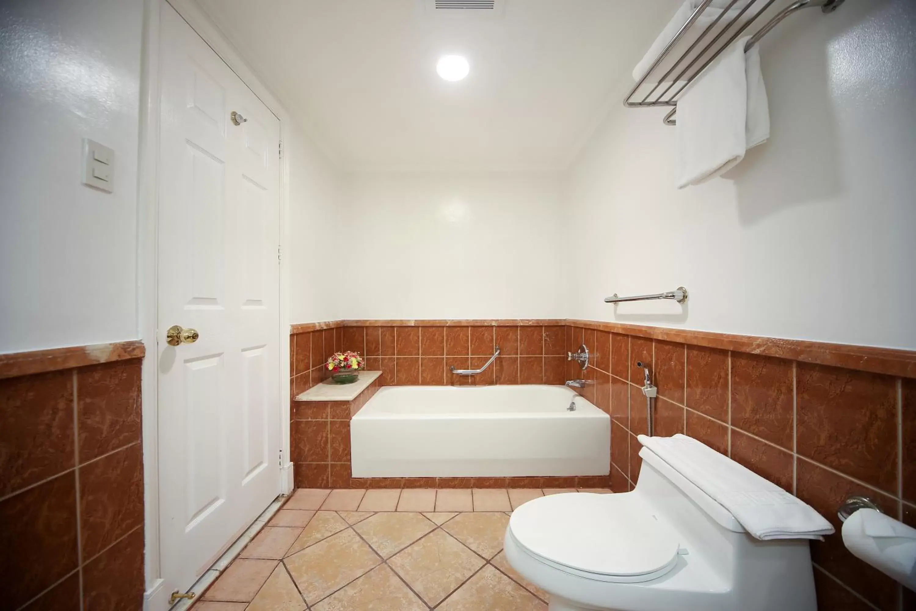 Toilet, Bathroom in Infinity Tower Suites