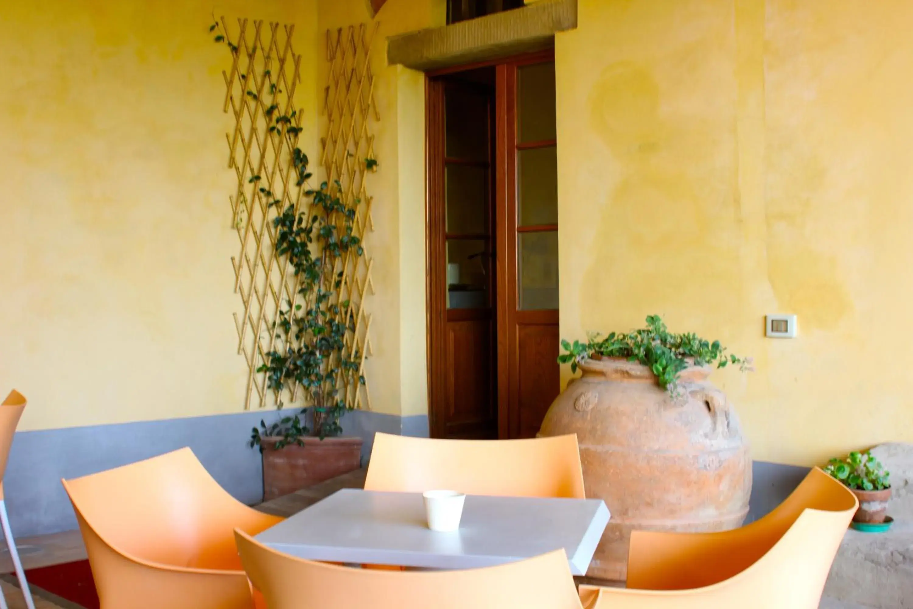 Patio, Dining Area in Hotel Le Capanne