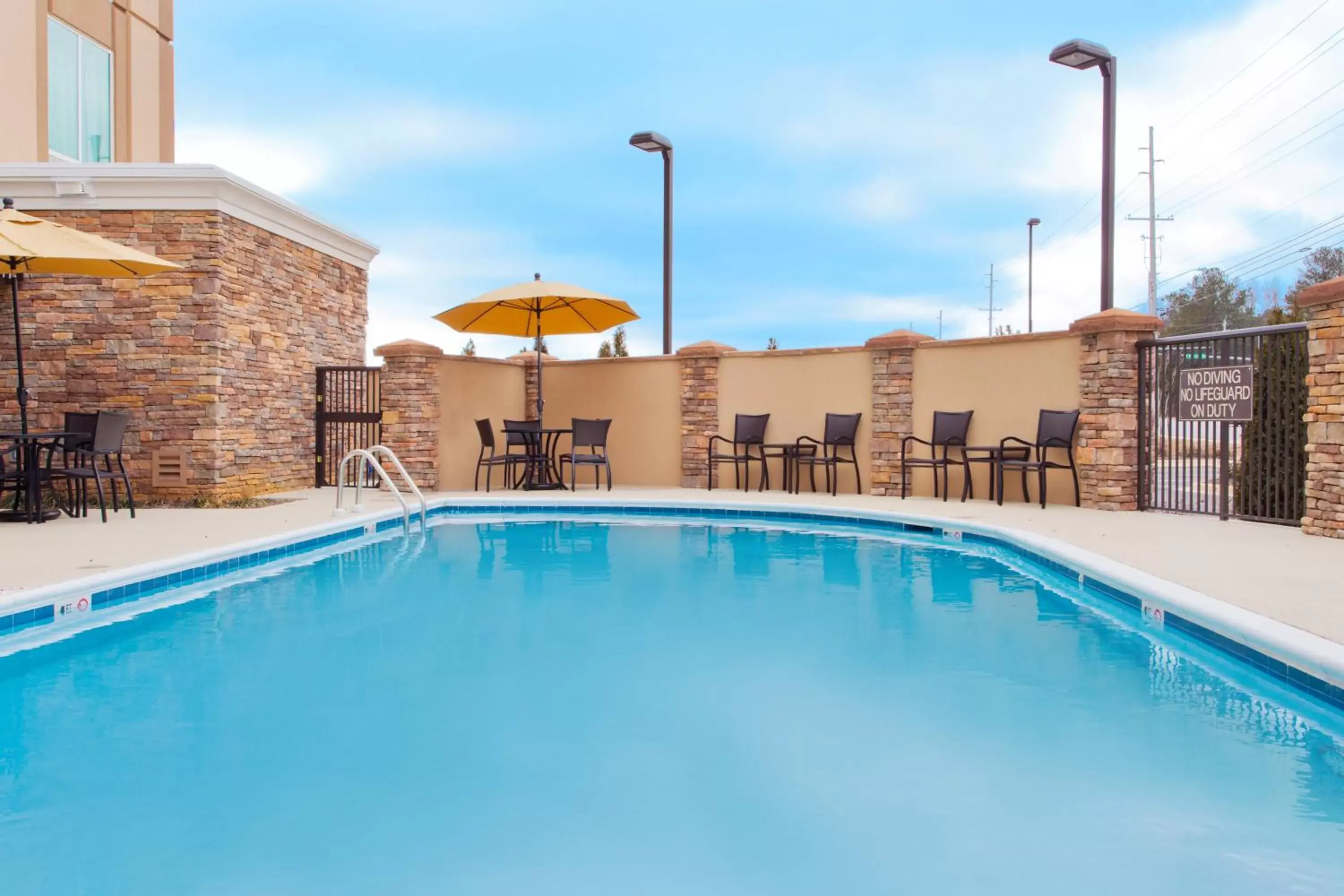 Swimming Pool in Holiday Inn Express Hotel & Suites Huntsville West - Research Park, an IHG Hotel
