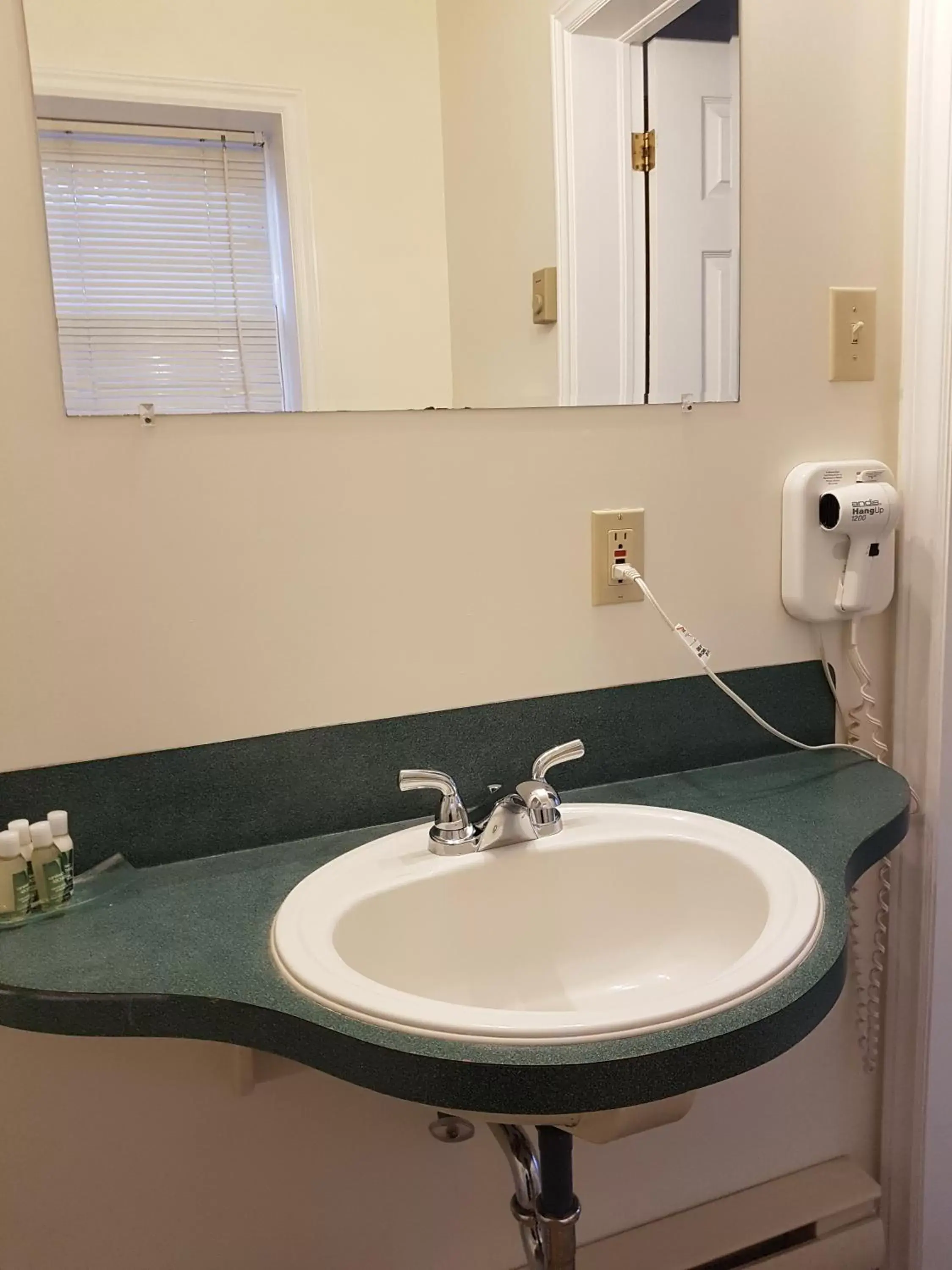 Bathroom in Covered Bridge Inn & Suites