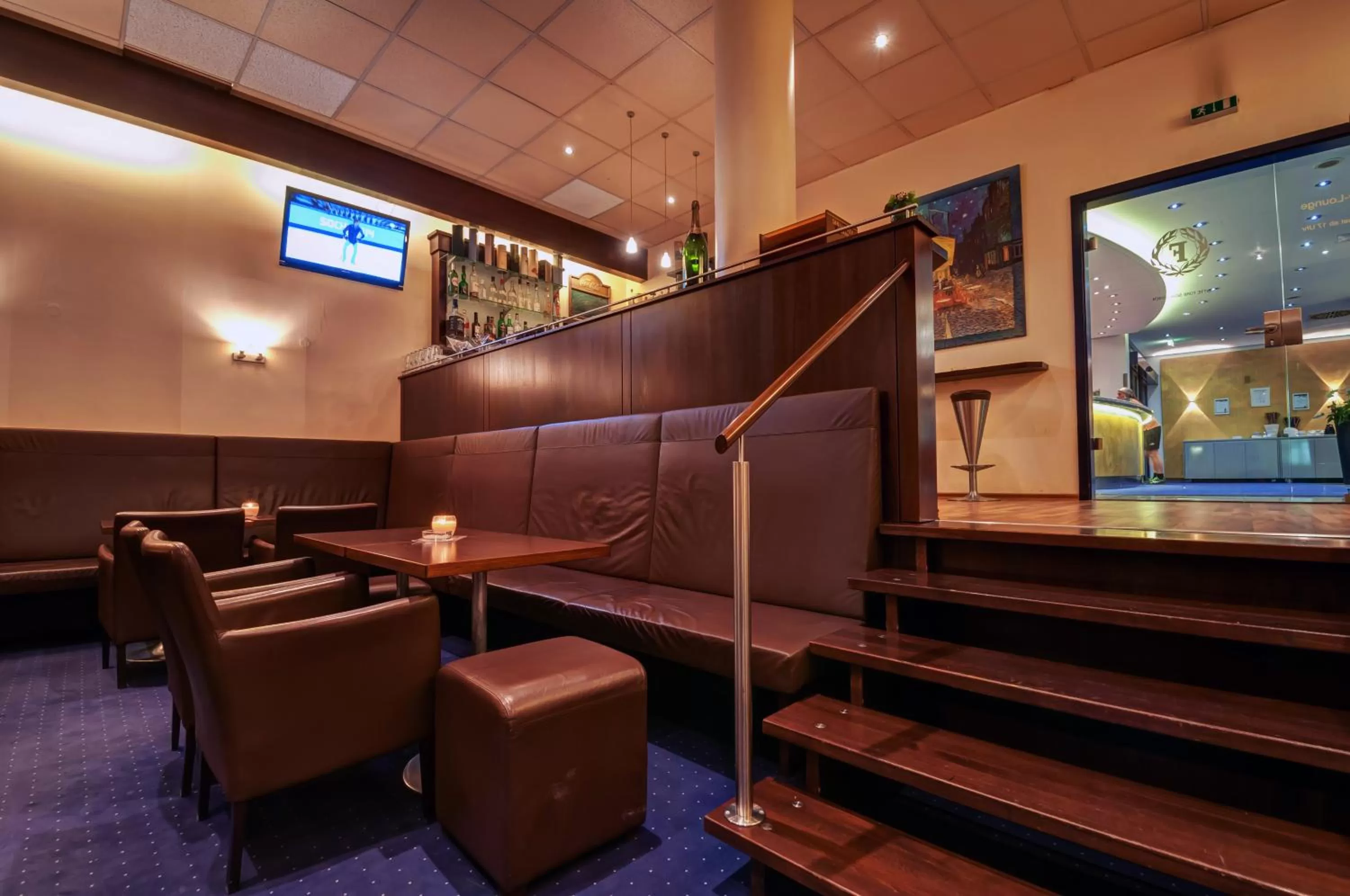 Communal lounge/ TV room in City Hotel Fortuna Reutlingen