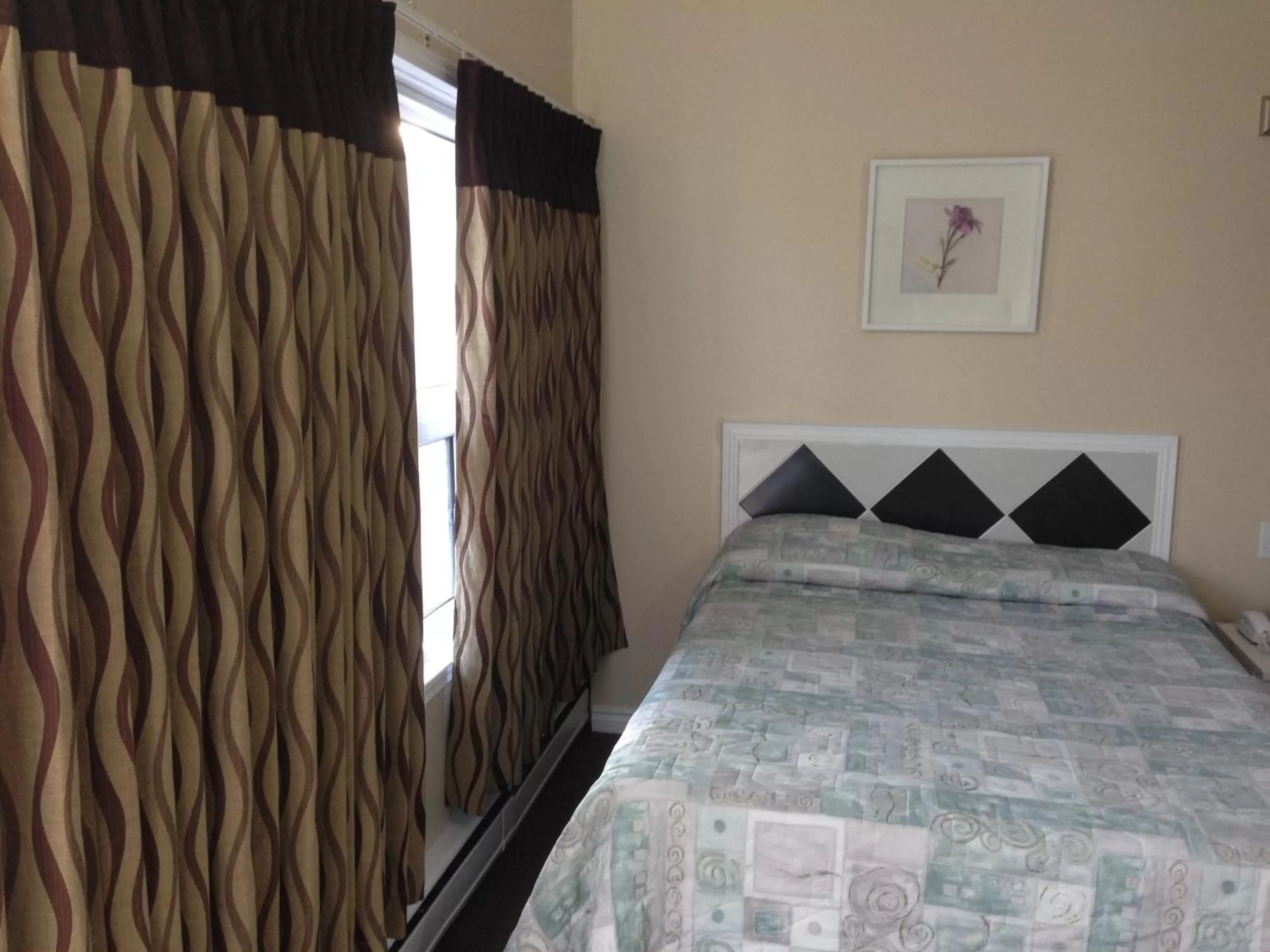 Bed in Davidson Motel