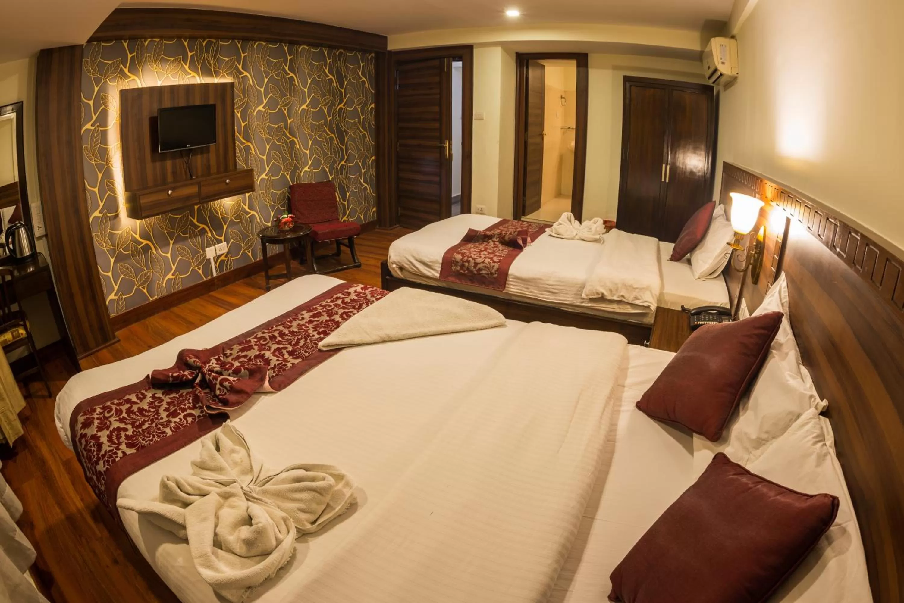 Communal lounge/ TV room, Bed in Hotel Yambu kathmandu