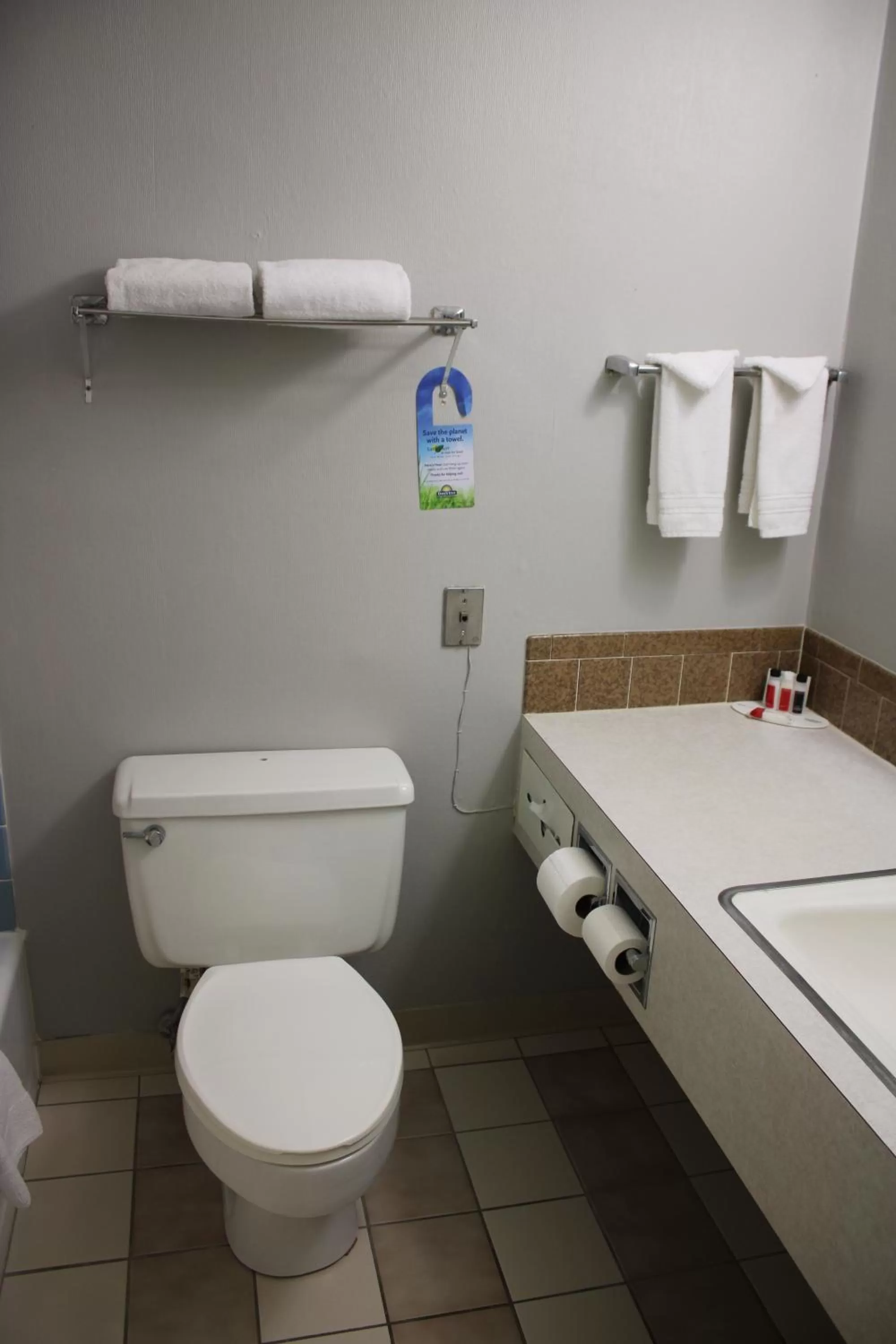 Toilet in Days Inn by Wyndham Hays