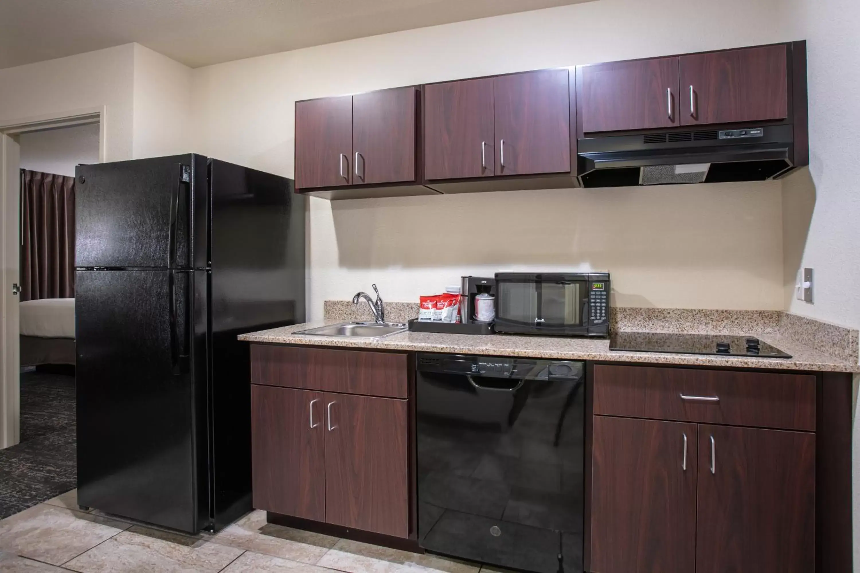 kitchen, Kitchen/Kitchenette in Cobblestone Inn & Suites - Pine Bluffs