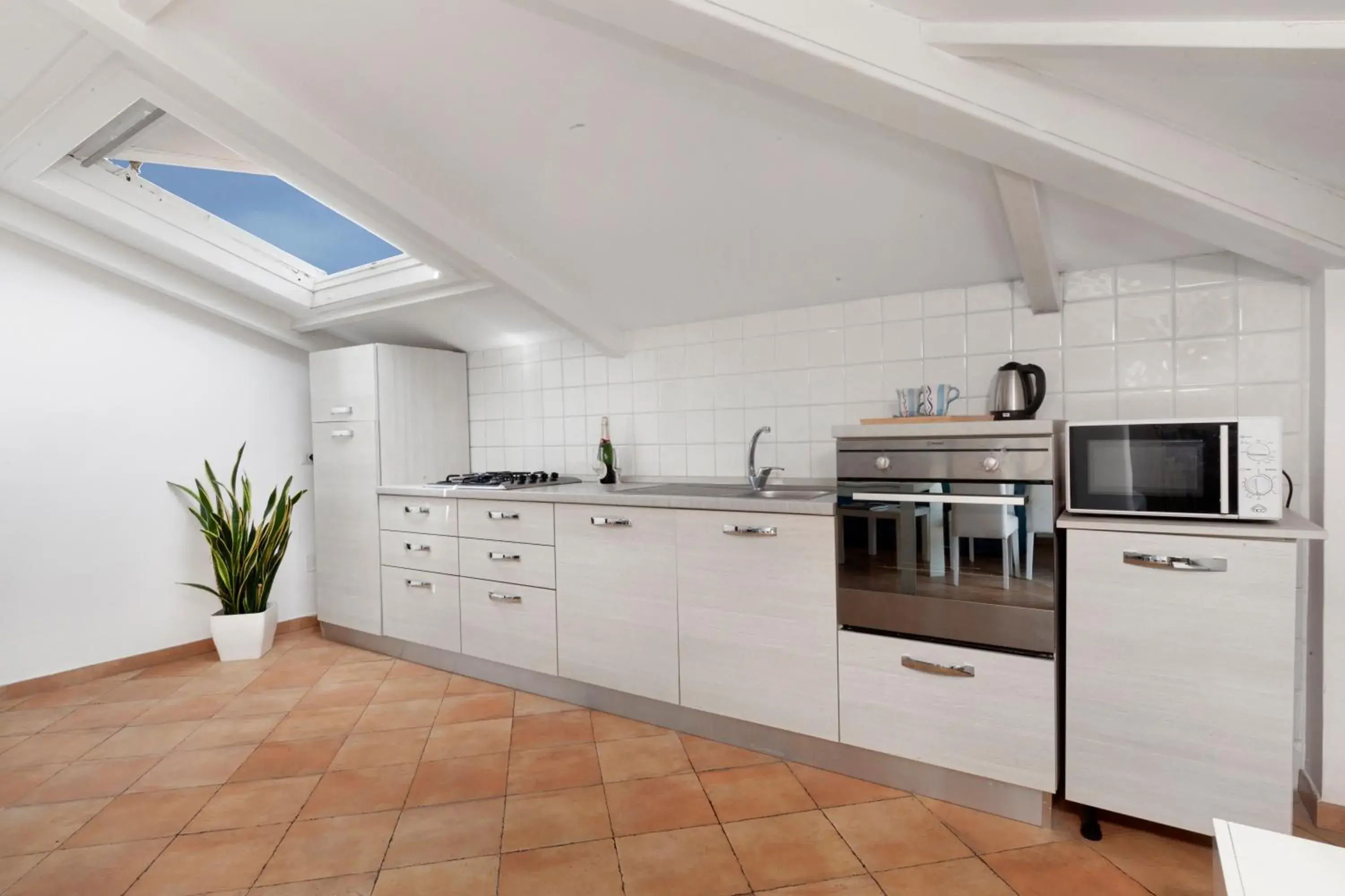 Kitchen or kitchenette in Tasso Suites