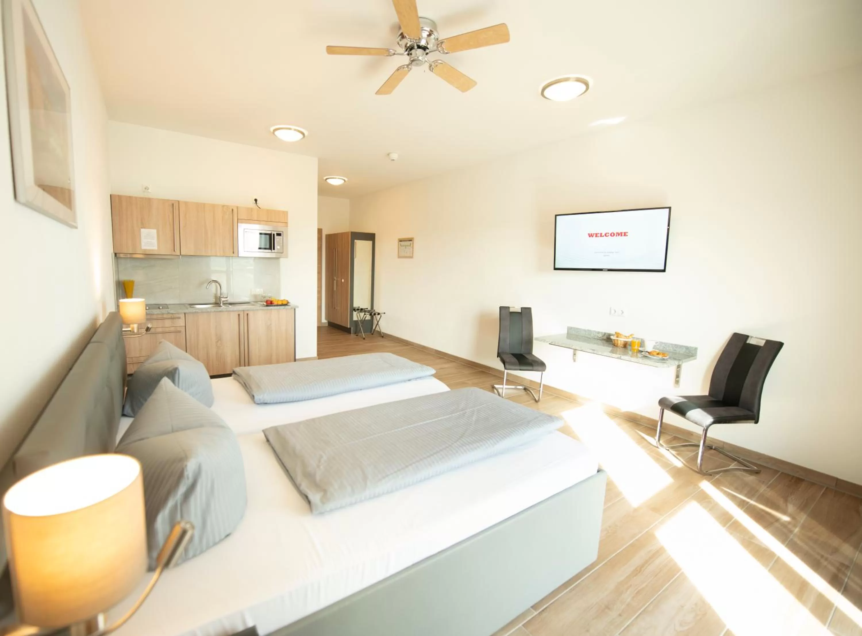 Photo of the whole room, Bed in Stadthotel Donauwörth