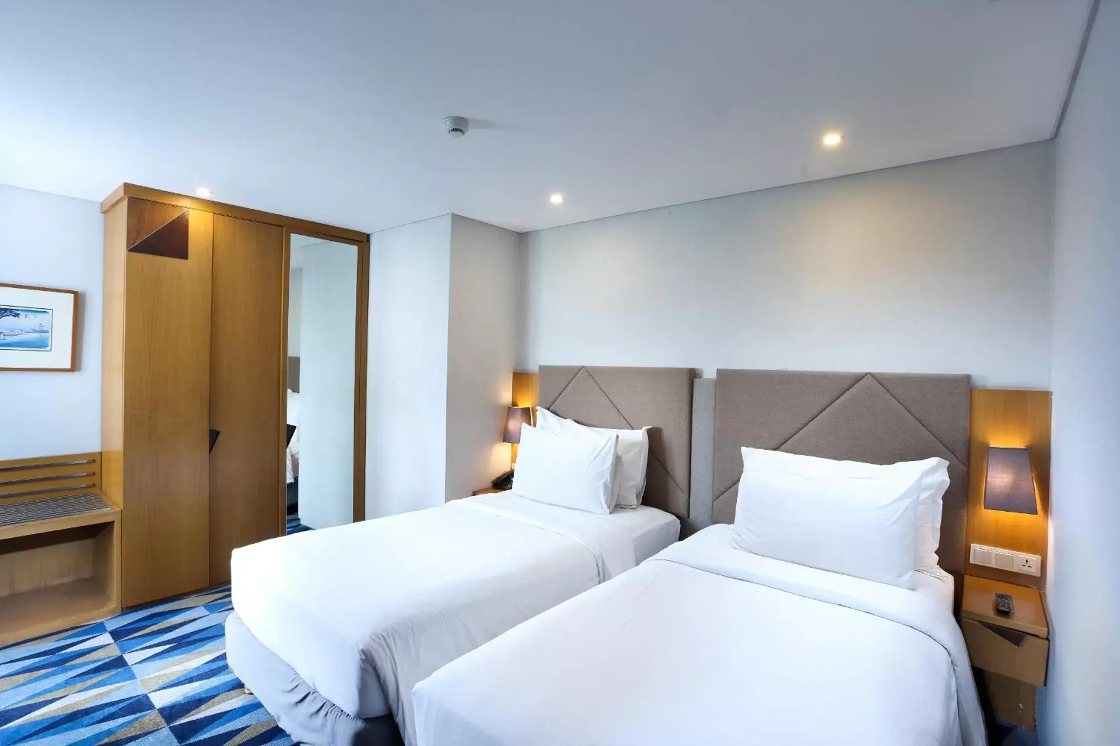 Two-Bedroom Family Suite with Queen and Twin Beds in Swiss-Belhotel Pondok Indah Two-Bedroom Family Suite with Queen and Twin Beds in Swiss-Belhotel Pondok Indah