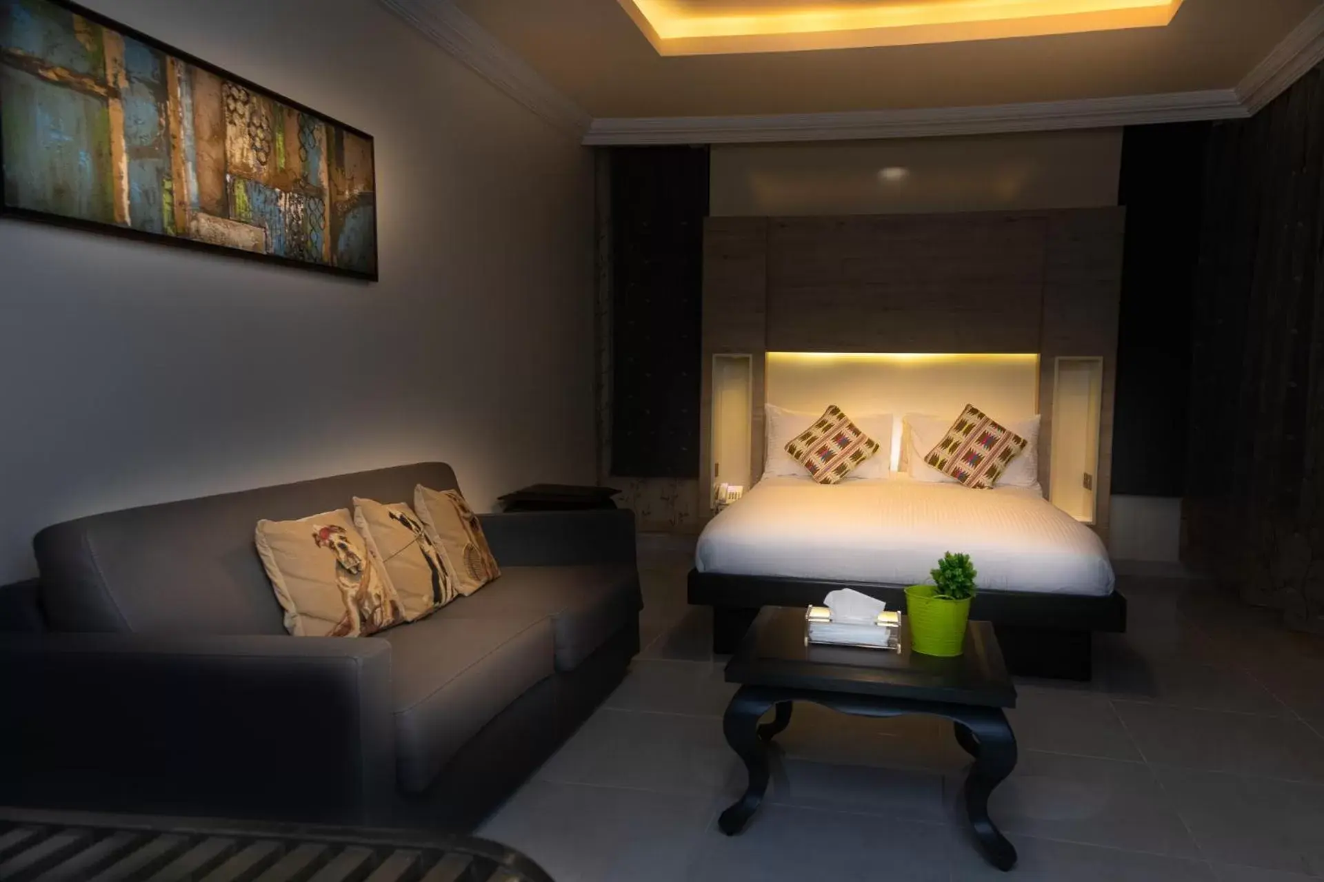 Bedroom, Seating Area in Home Suites Boutique Hotel