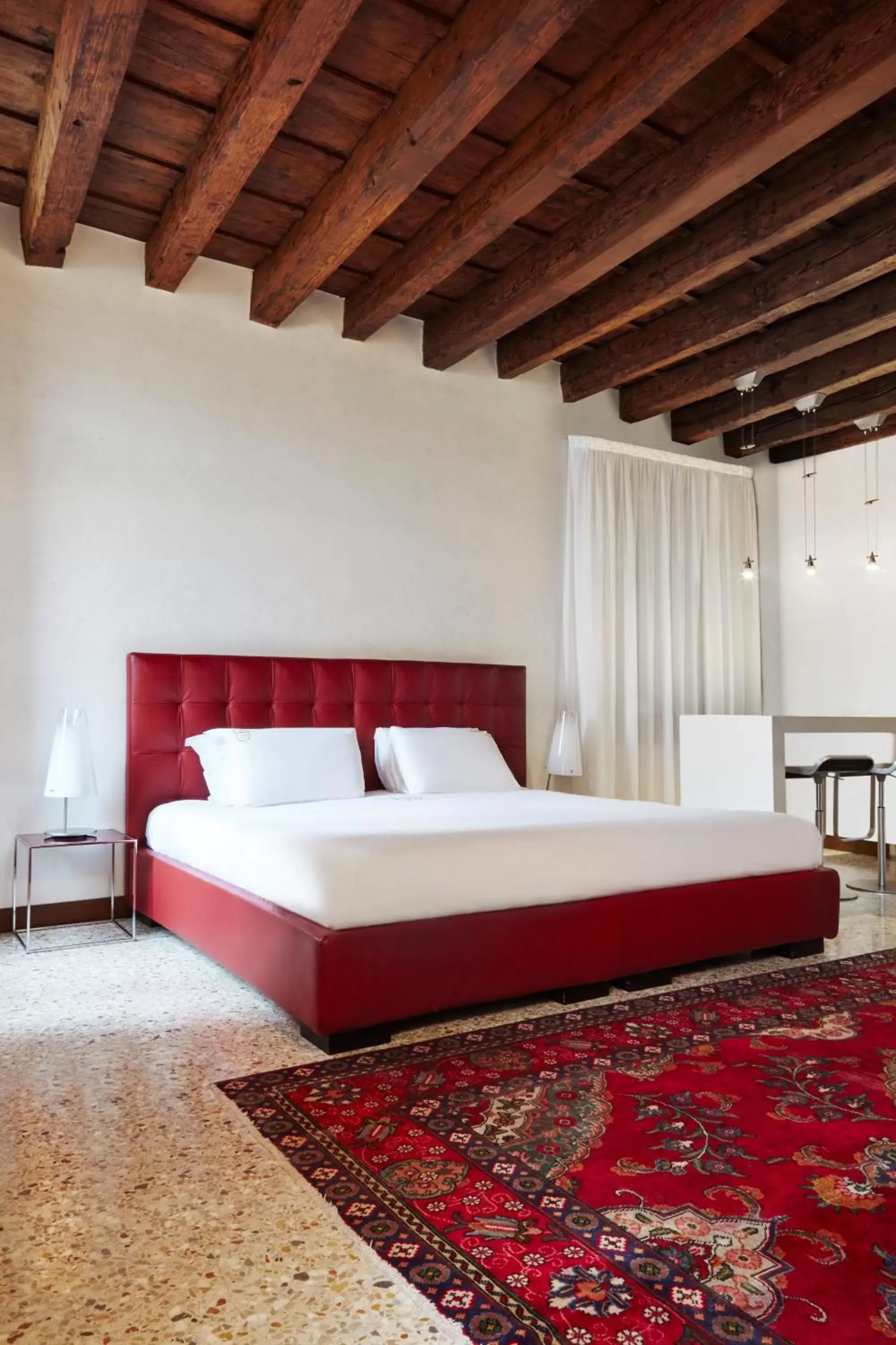 Bed in Palazzo Paruta & Wellness Suites