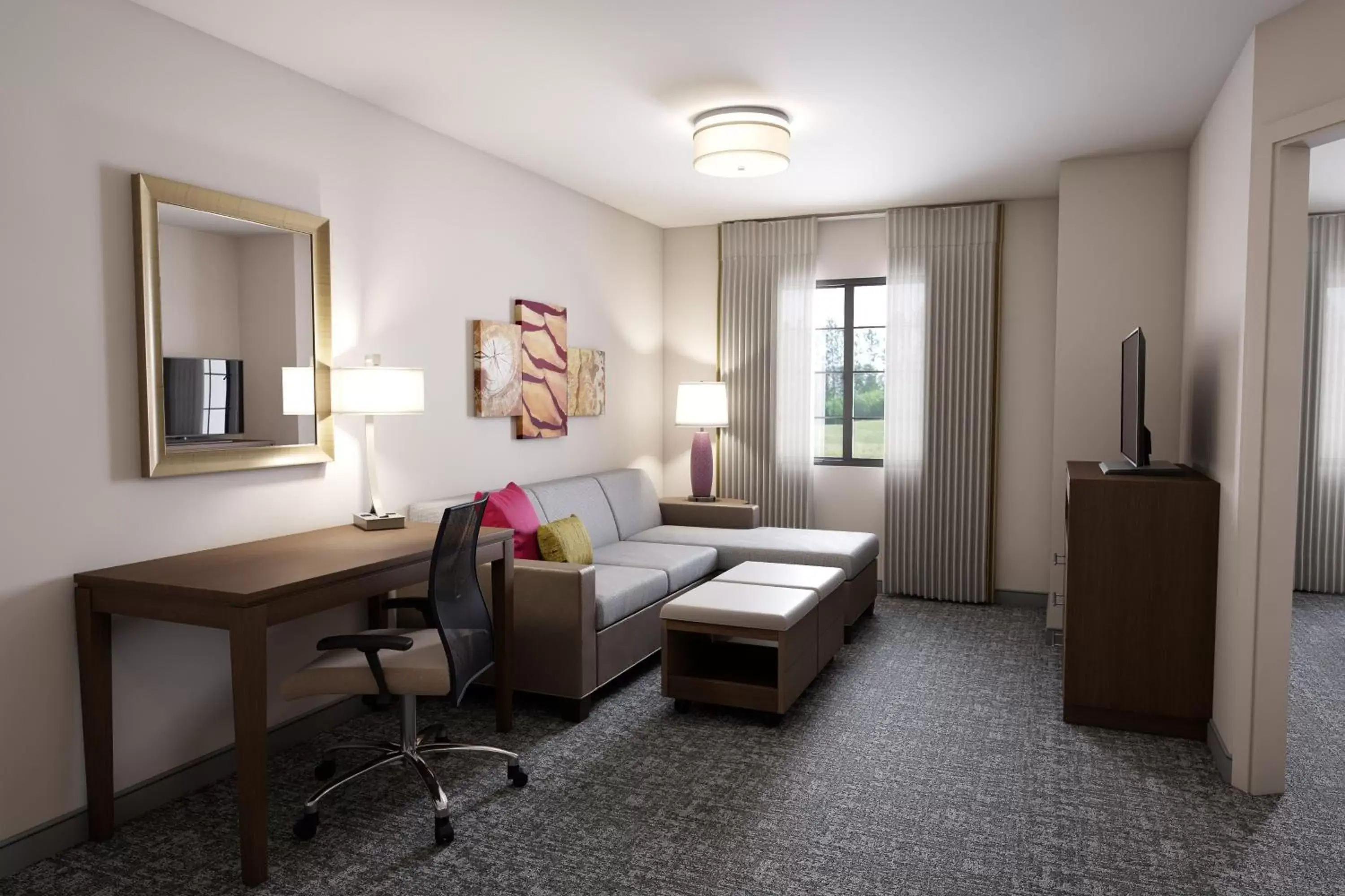 Bedroom, Seating Area in Staybridge Suites Columbus - Fort Benning, an IHG Hotel