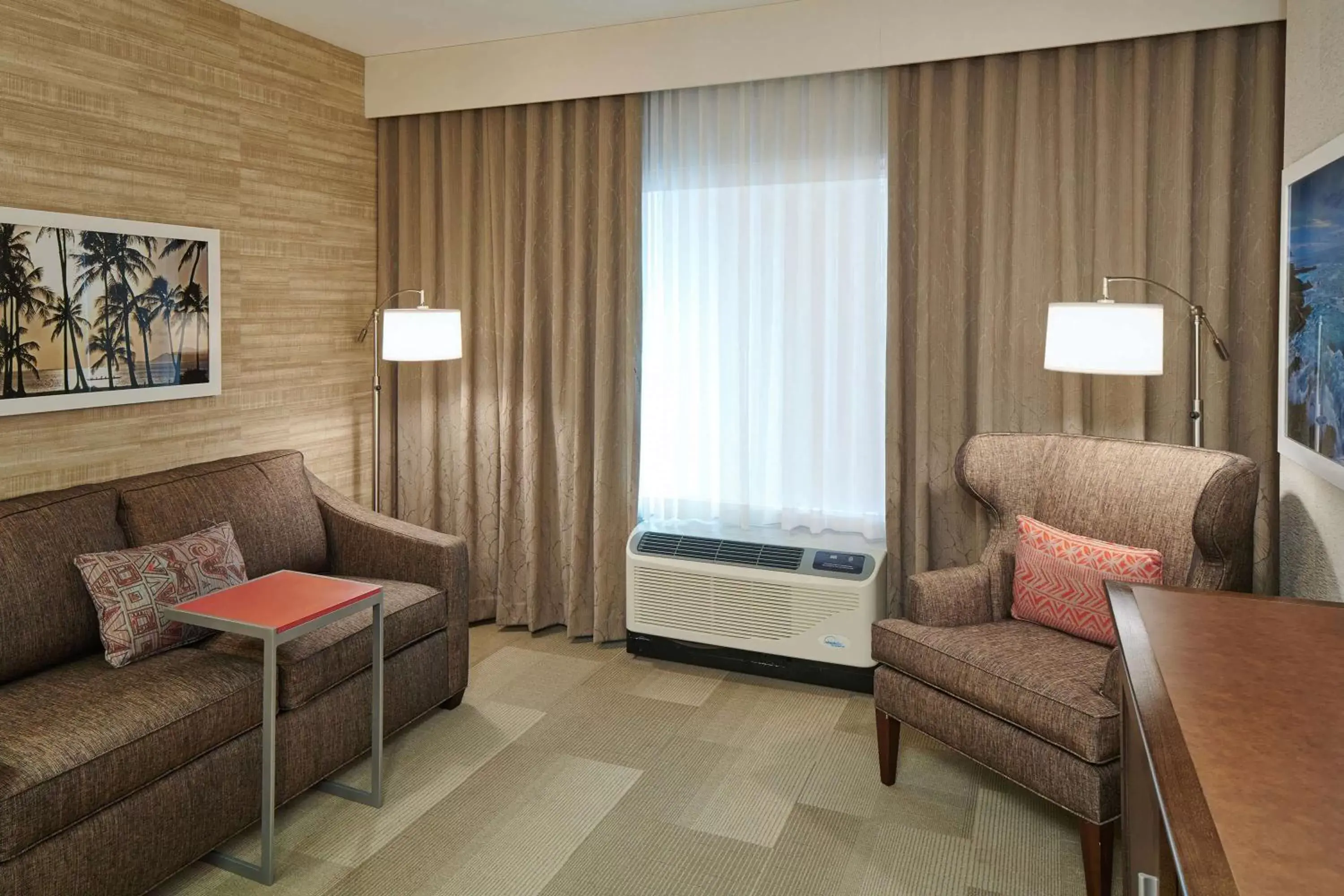 Living room, Seating Area in Hampton Inn & Suites Oahu/Kapolei, HI - FREE Breakfast