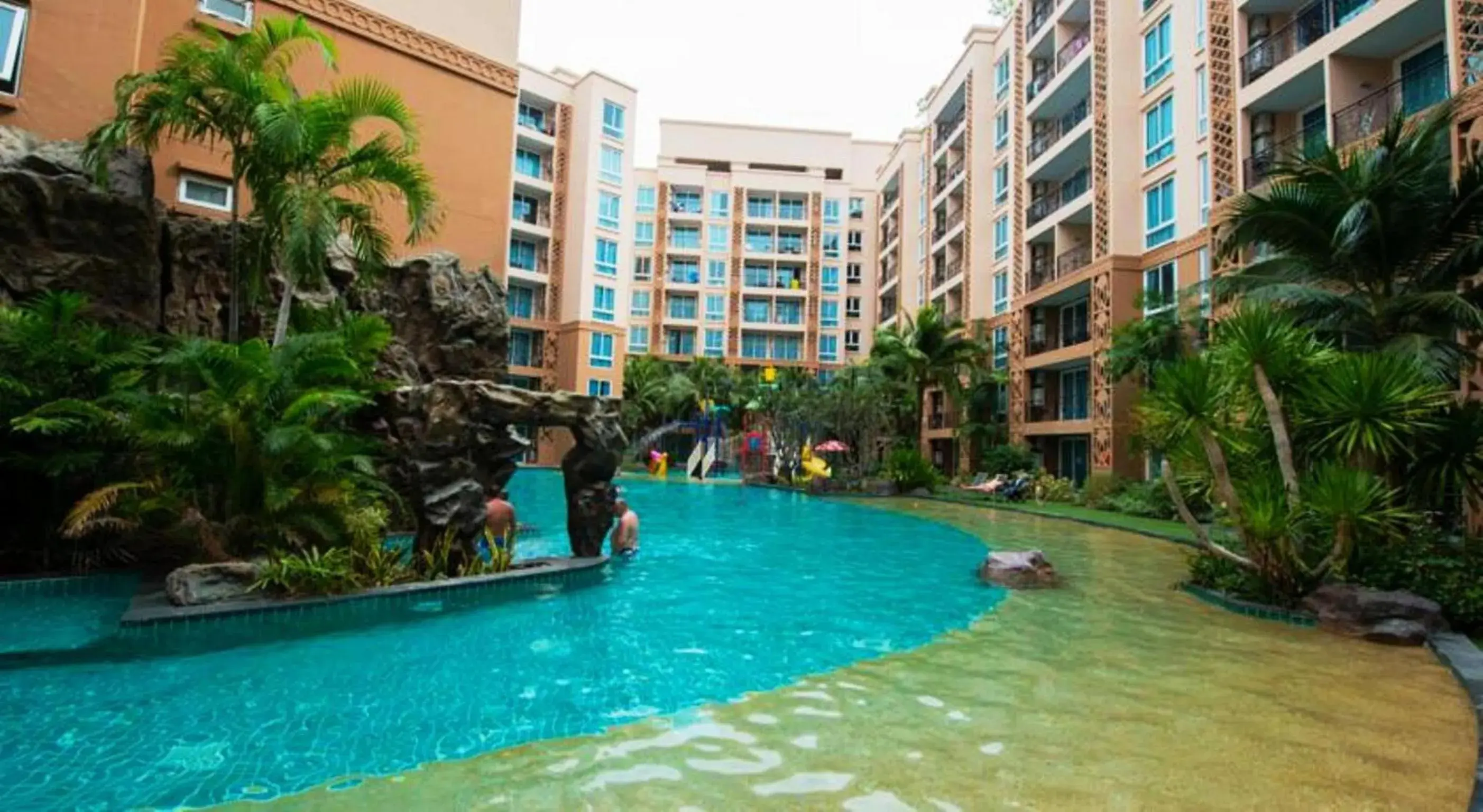 Property building, Swimming Pool in Atlantic Condo Resort Pattaya by Panisara