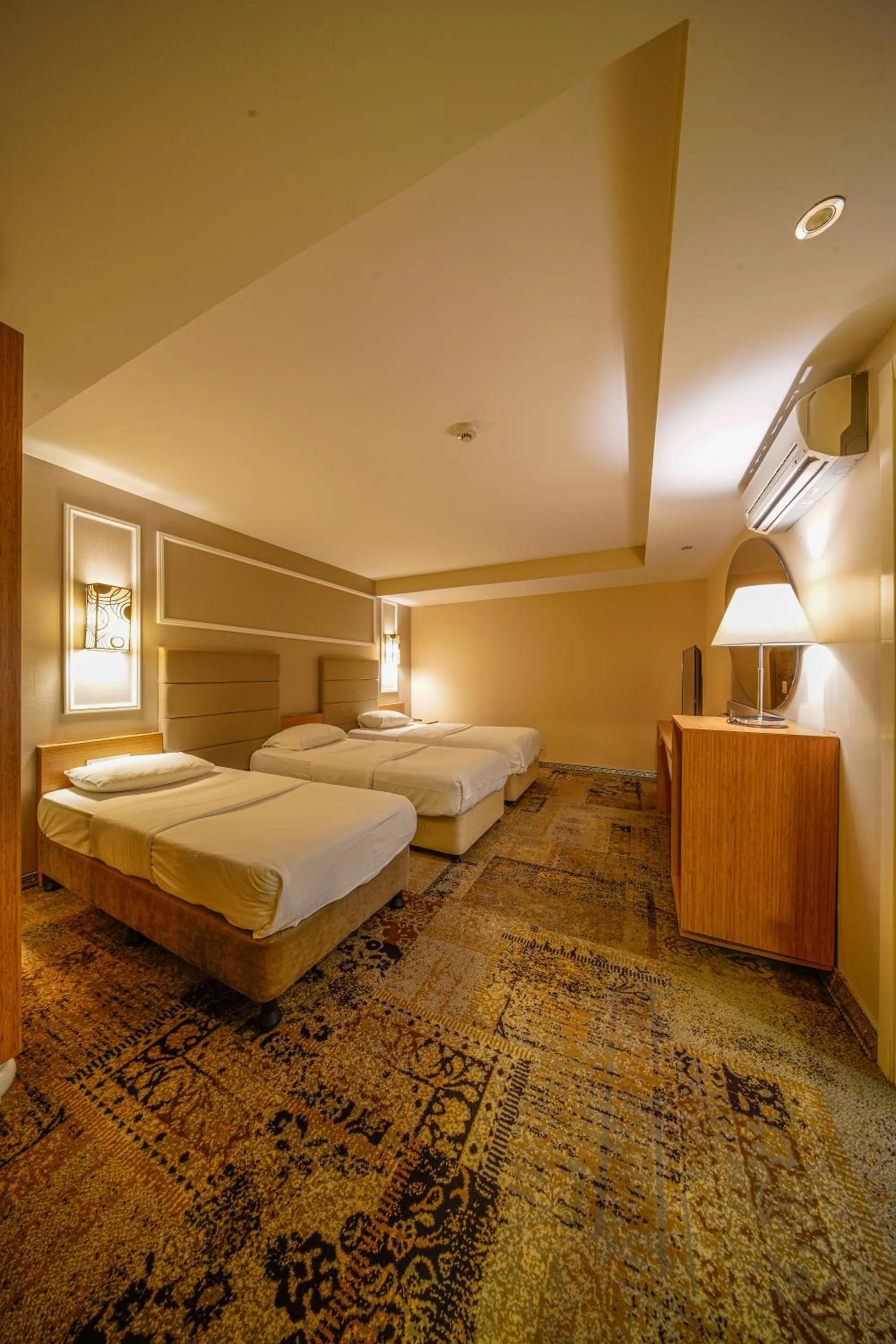 Bed in All Seasons Hotel