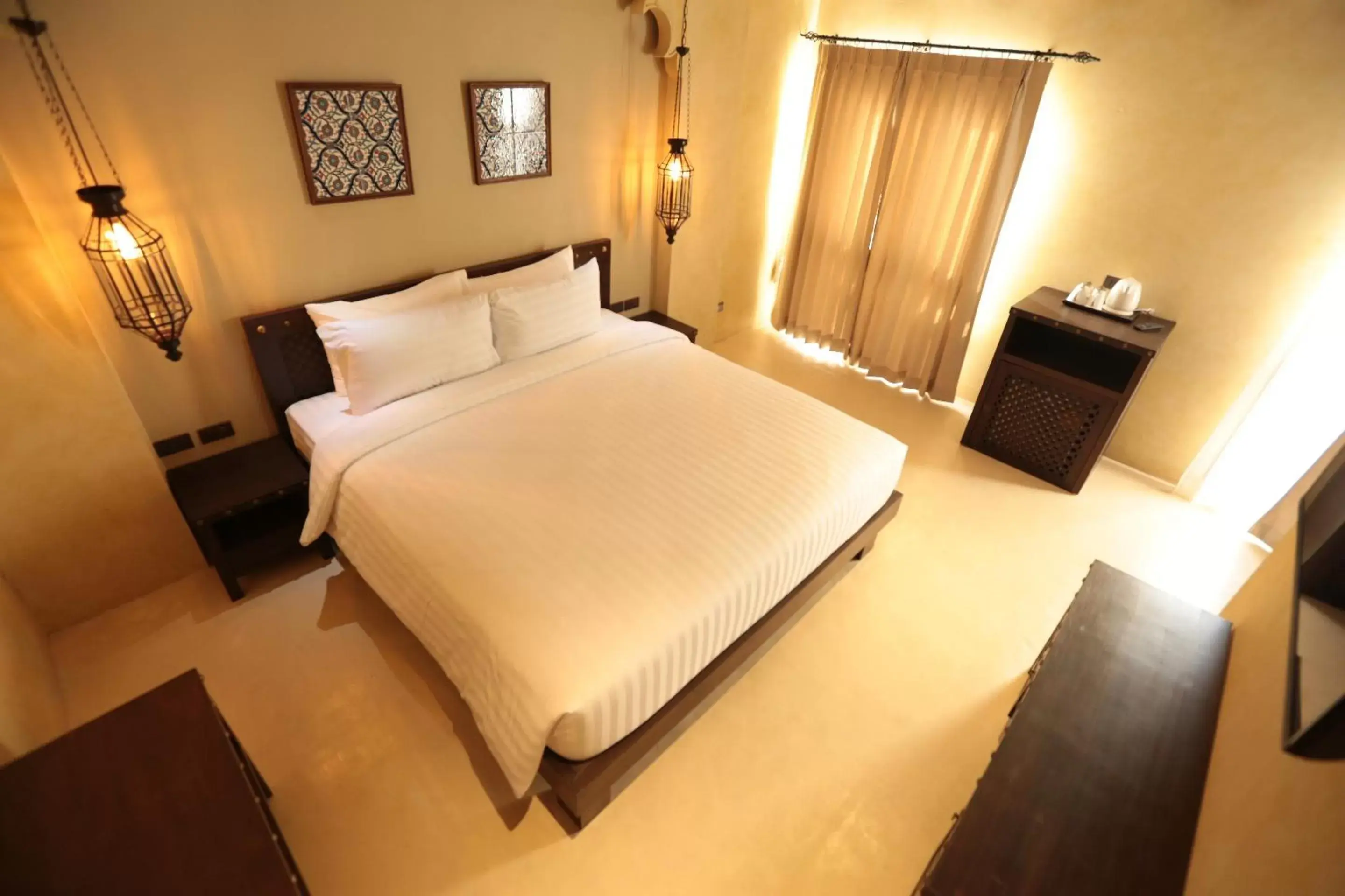 Photo of the whole room, Bed in Dewan Bangkok - SHA Certified
