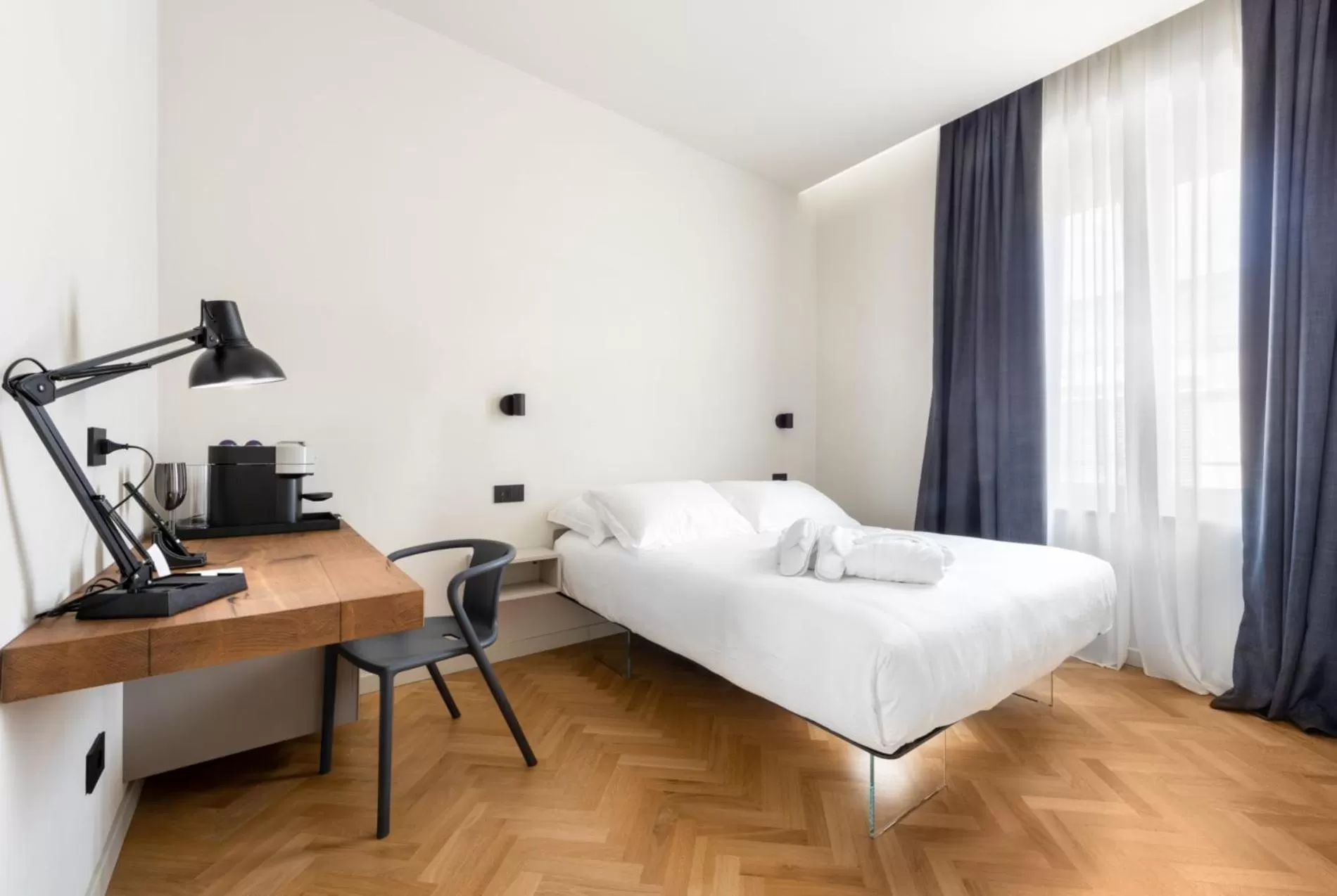 Bed in Villa Fedora Luxury Suites