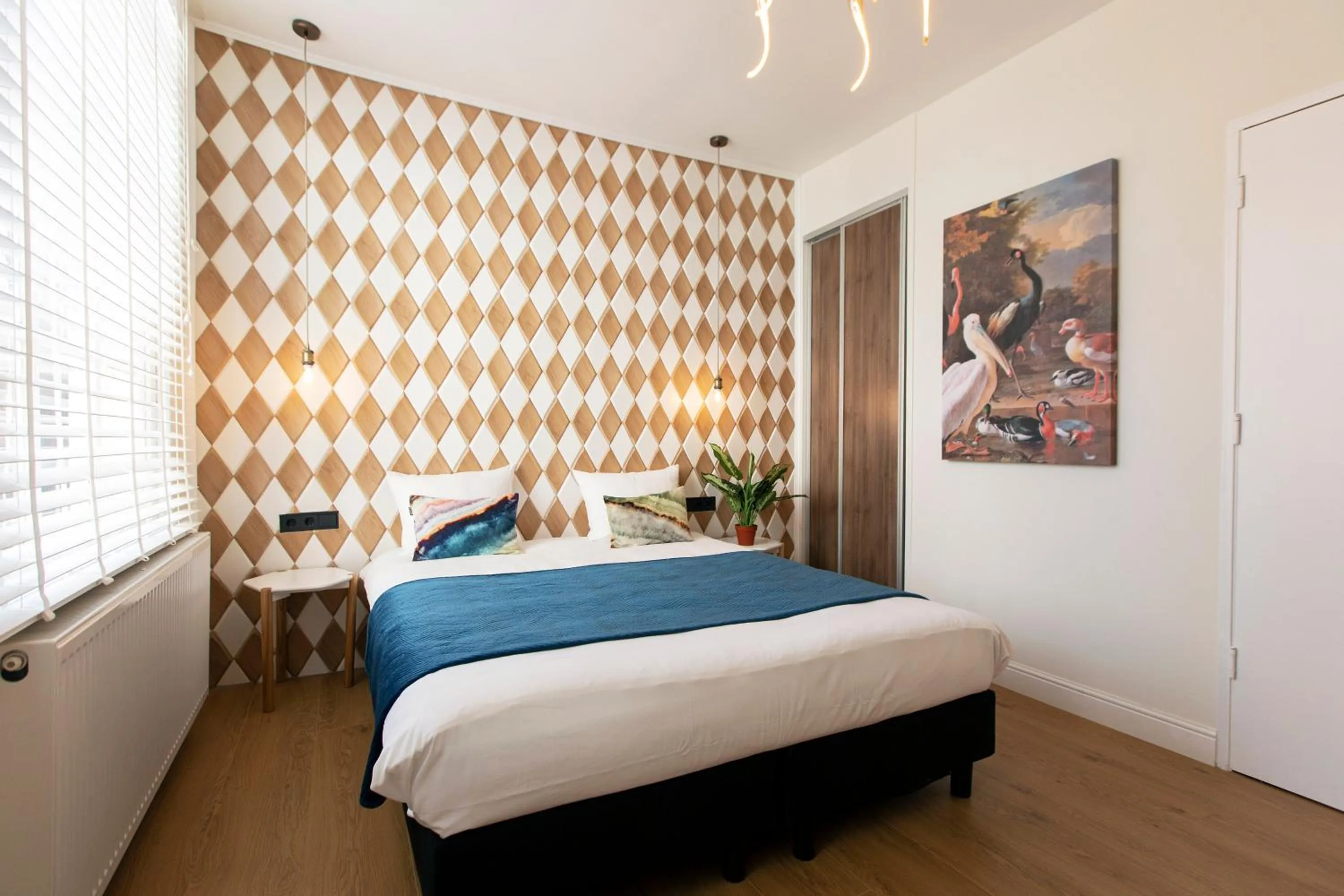 Bed in Quentin Golden Bear Hotel