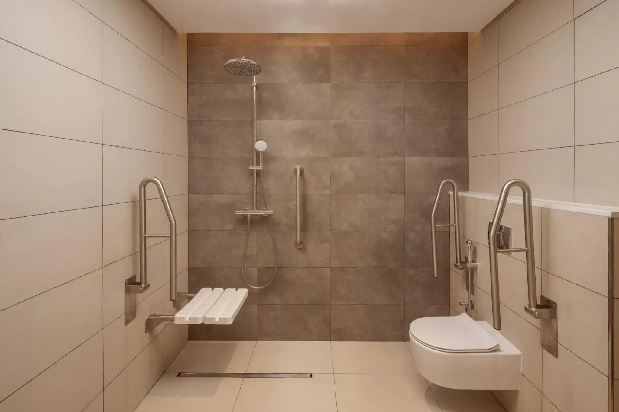 Photo of the whole room, Bathroom in Holiday Inn Dubai Business Bay, an IHG Hotel