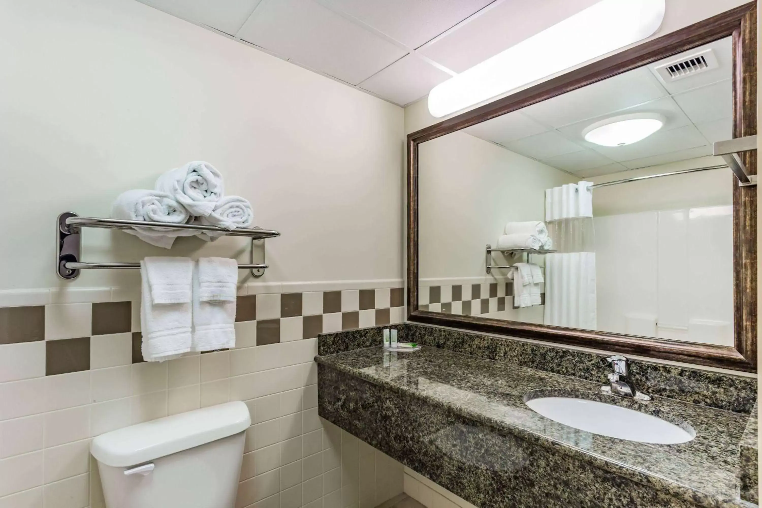 Bathroom in AmericInn by Wyndham Fort Pierre Conference Center