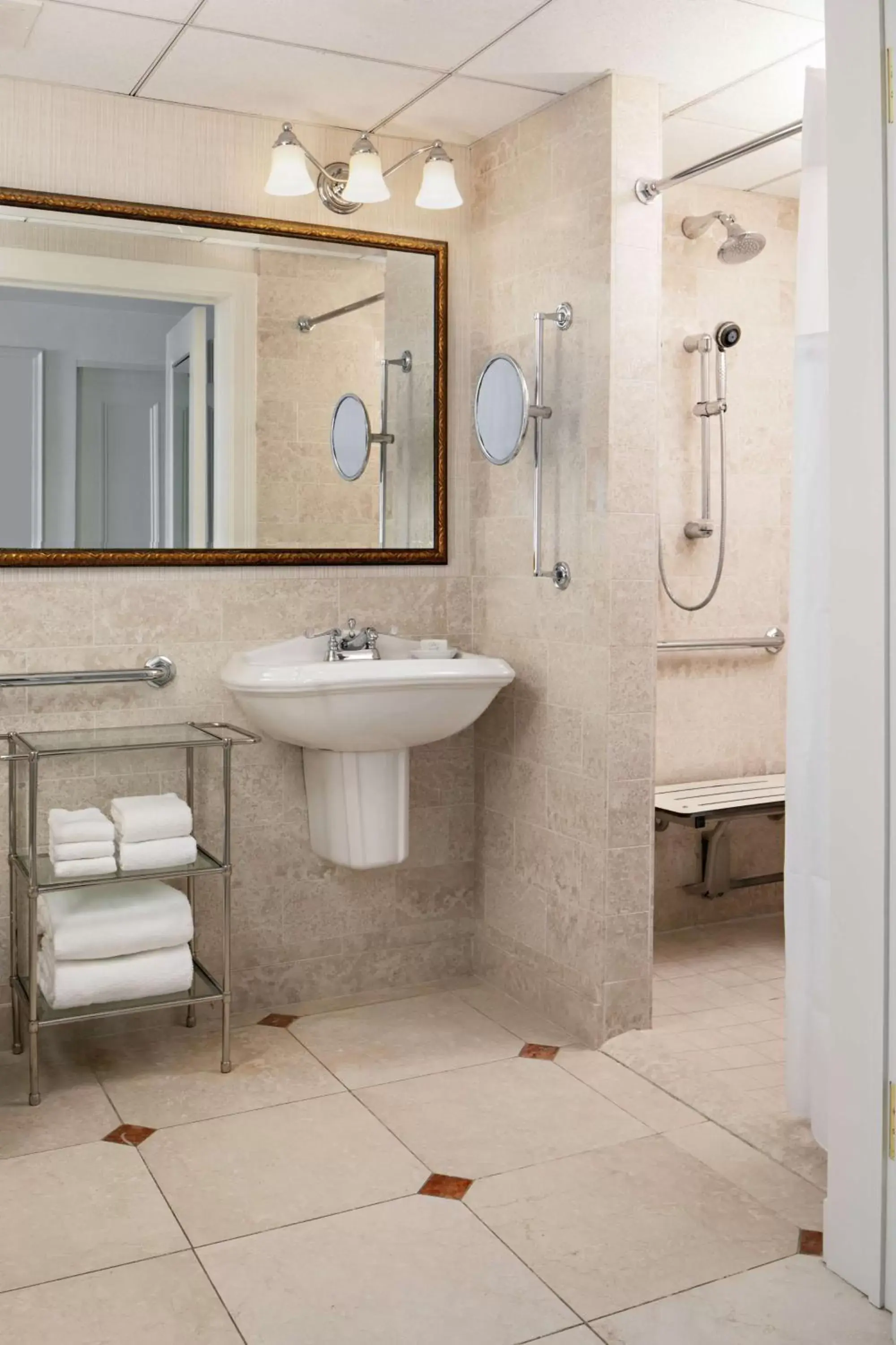 Bathroom in Amway Grand Plaza Hotel, Curio Collection by Hilton