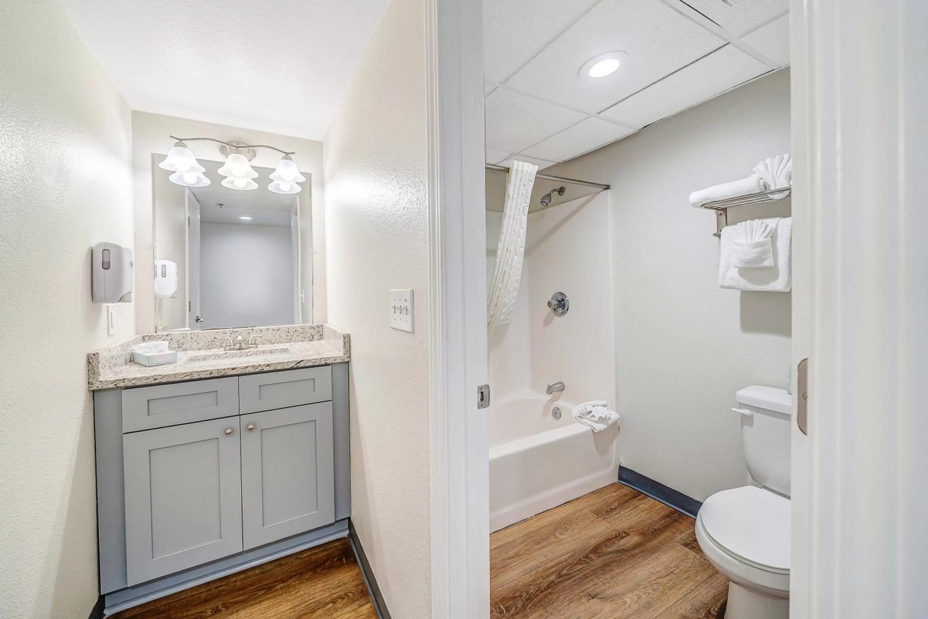 Shower in Sugar Sands Beachfront Hotel, a By The Sea Resort