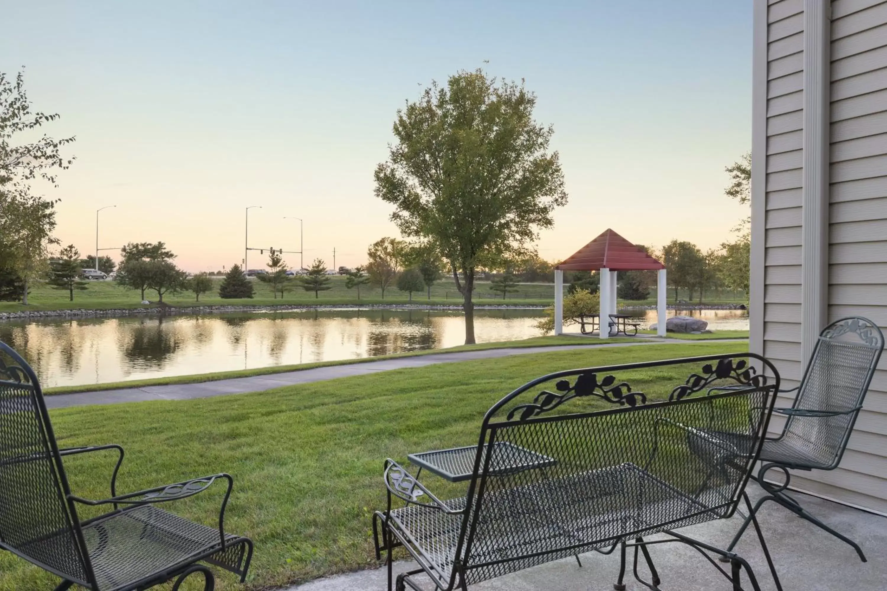 Lake view, Garden in Country Inn & Suites by Radisson, Ankeny, IA
