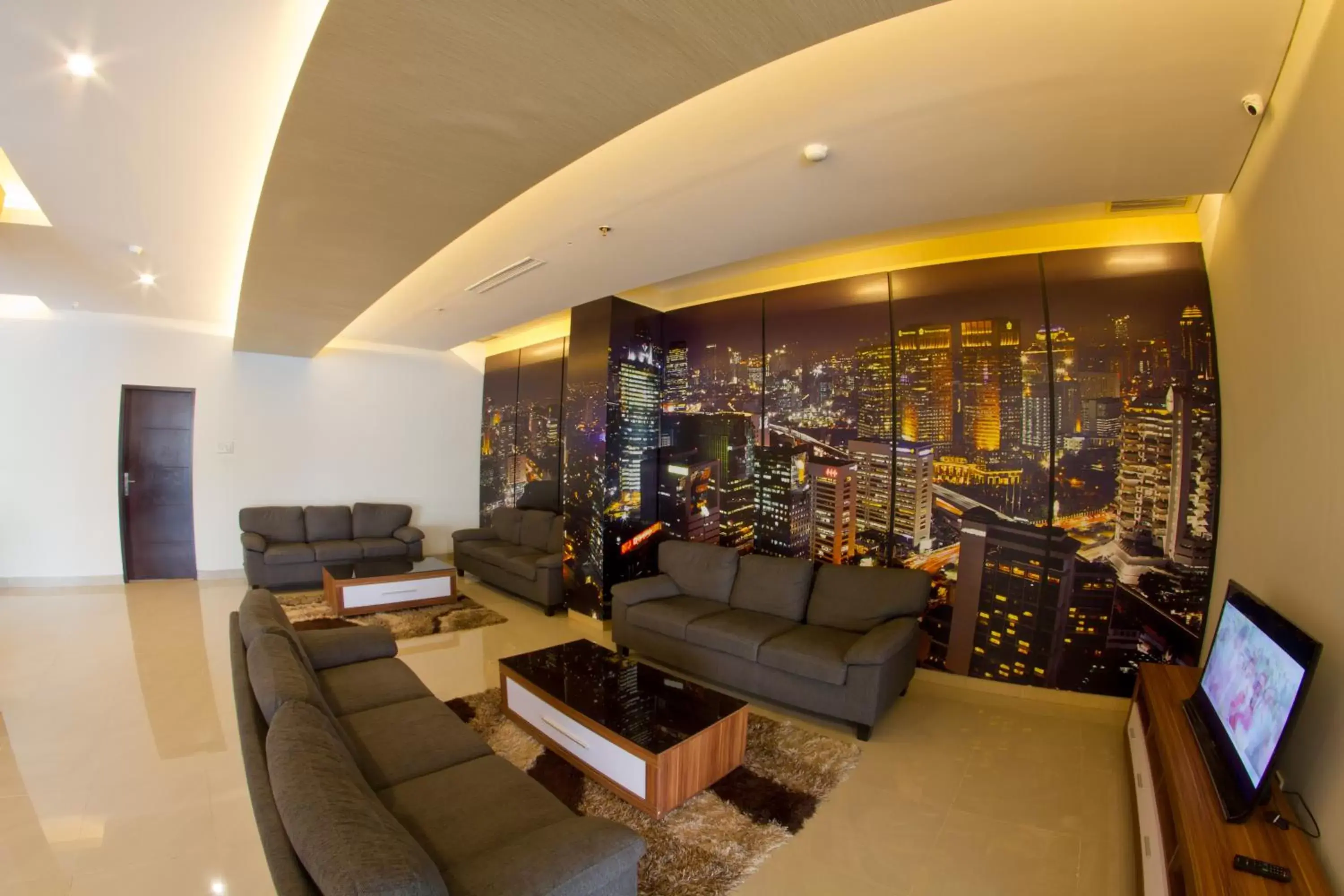 Communal lounge/ TV room in Hotel 88 Mangga Besar 62 Lokasari By WH