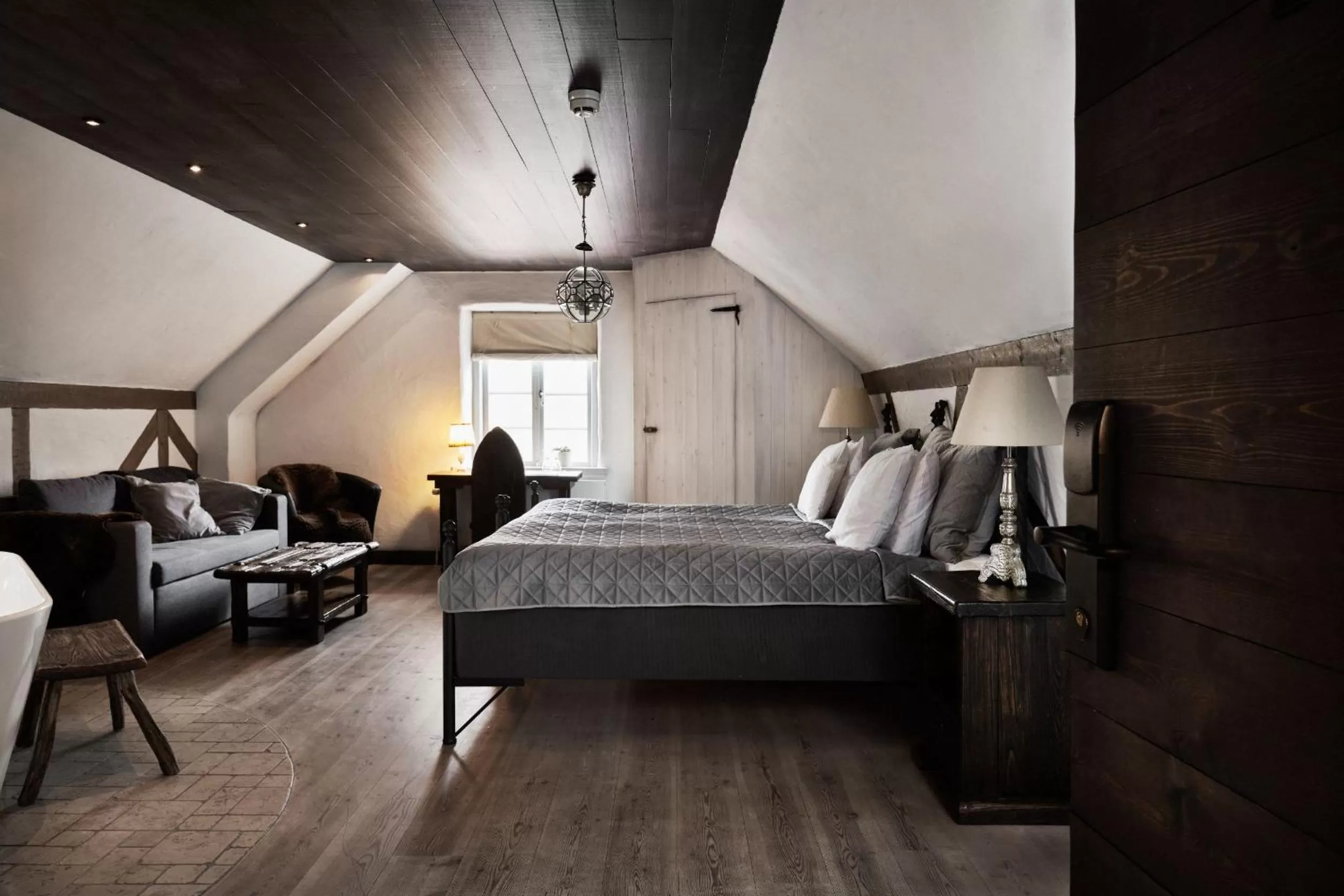 Photo of the whole room, Bed in Hotel Helgeand Wisby