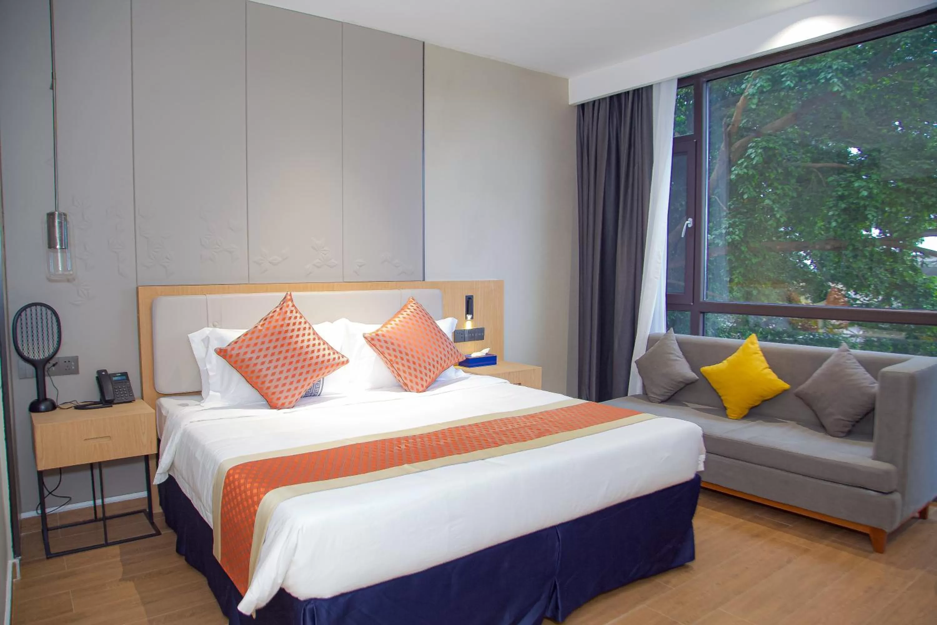 Photo of the whole room in Hôtel FAMILLE MONDIALE