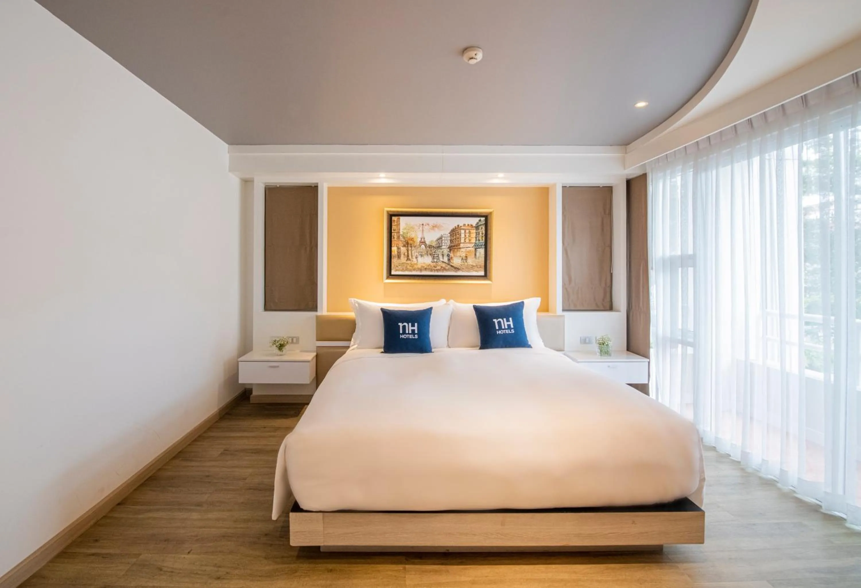 Bed in NH Boat Lagoon Phuket Resort