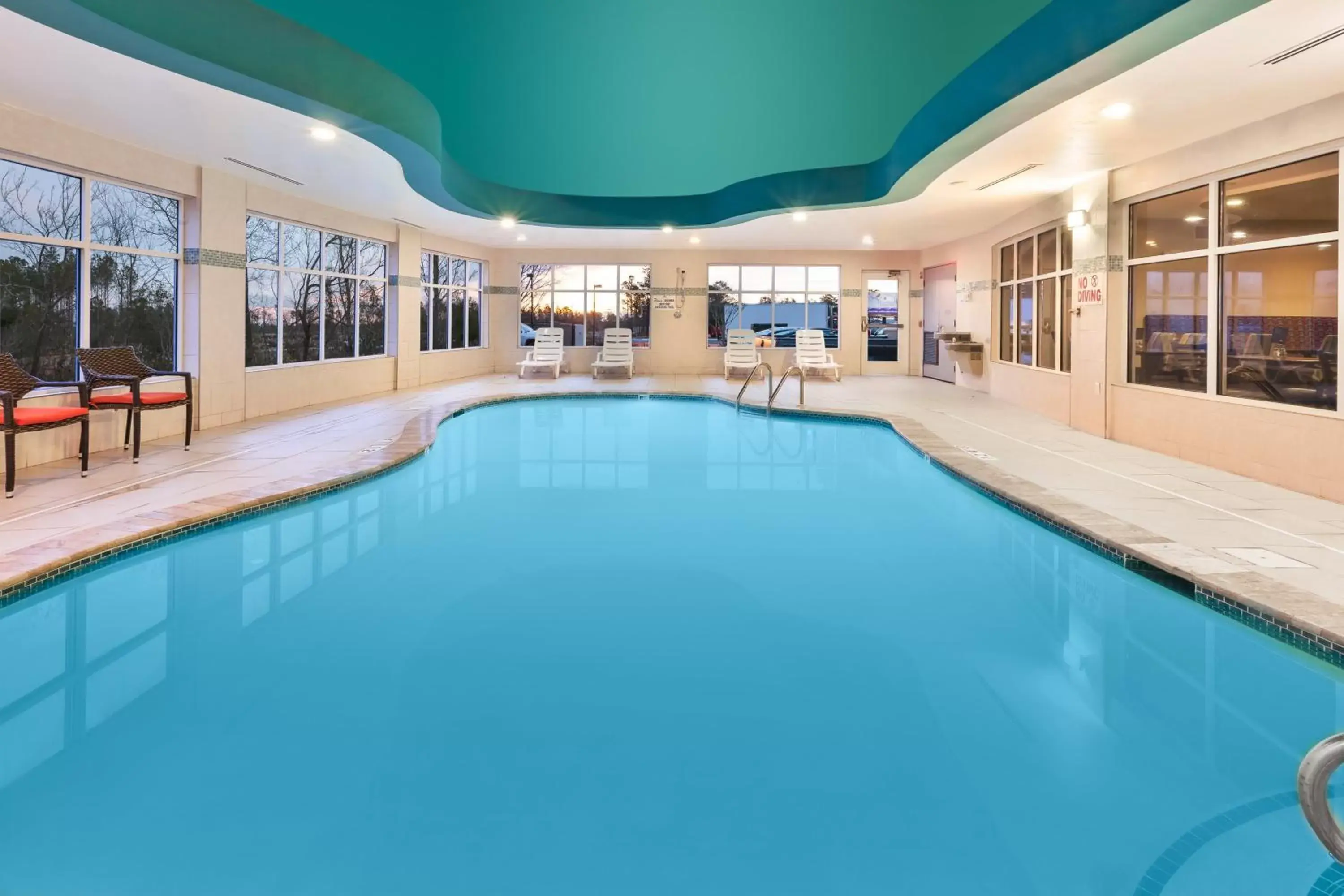 Swimming Pool in Holiday Inn Express & Suites Southport - Oak Island Area, an IHG Hotel