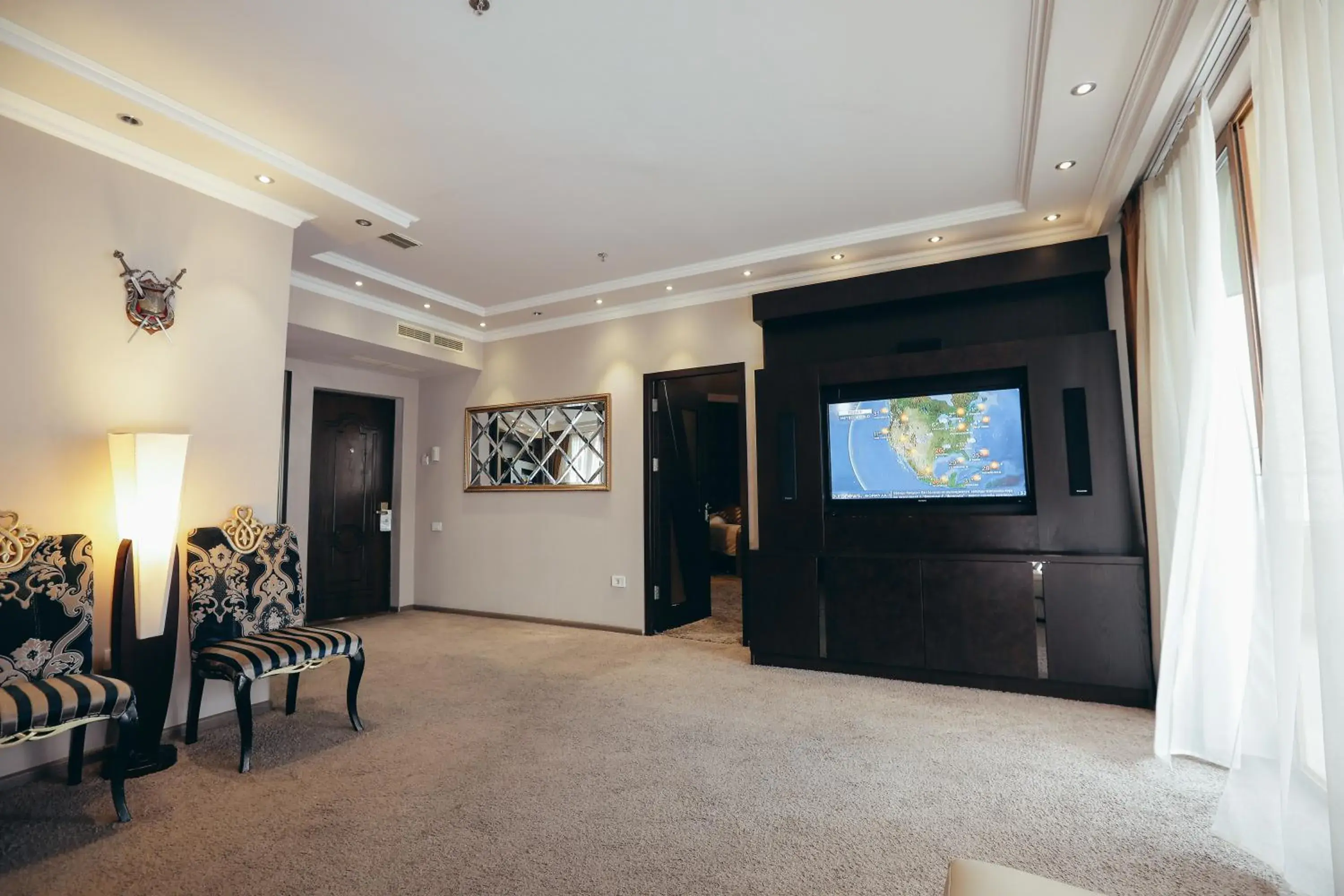 Seating area, TV/Entertainment Center in Imperial Palace Hotel