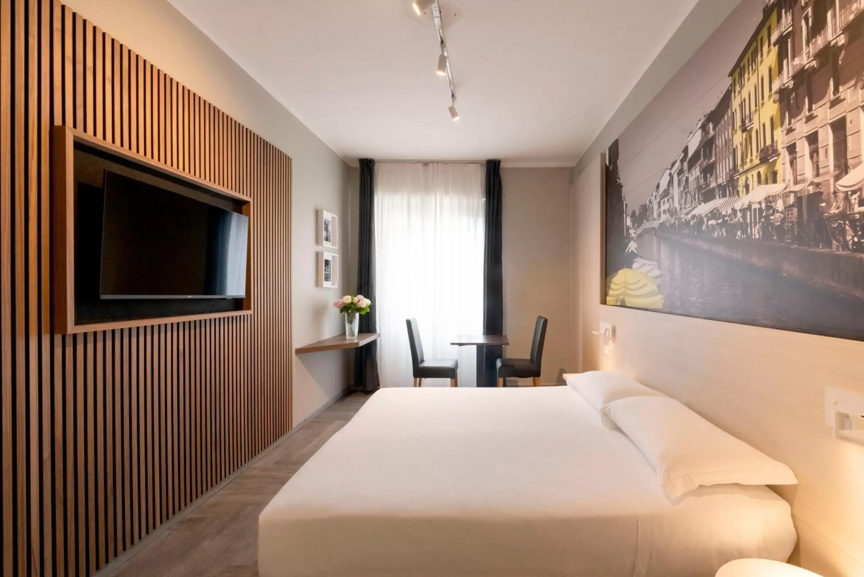 Bed in Kleos Hotel Milano