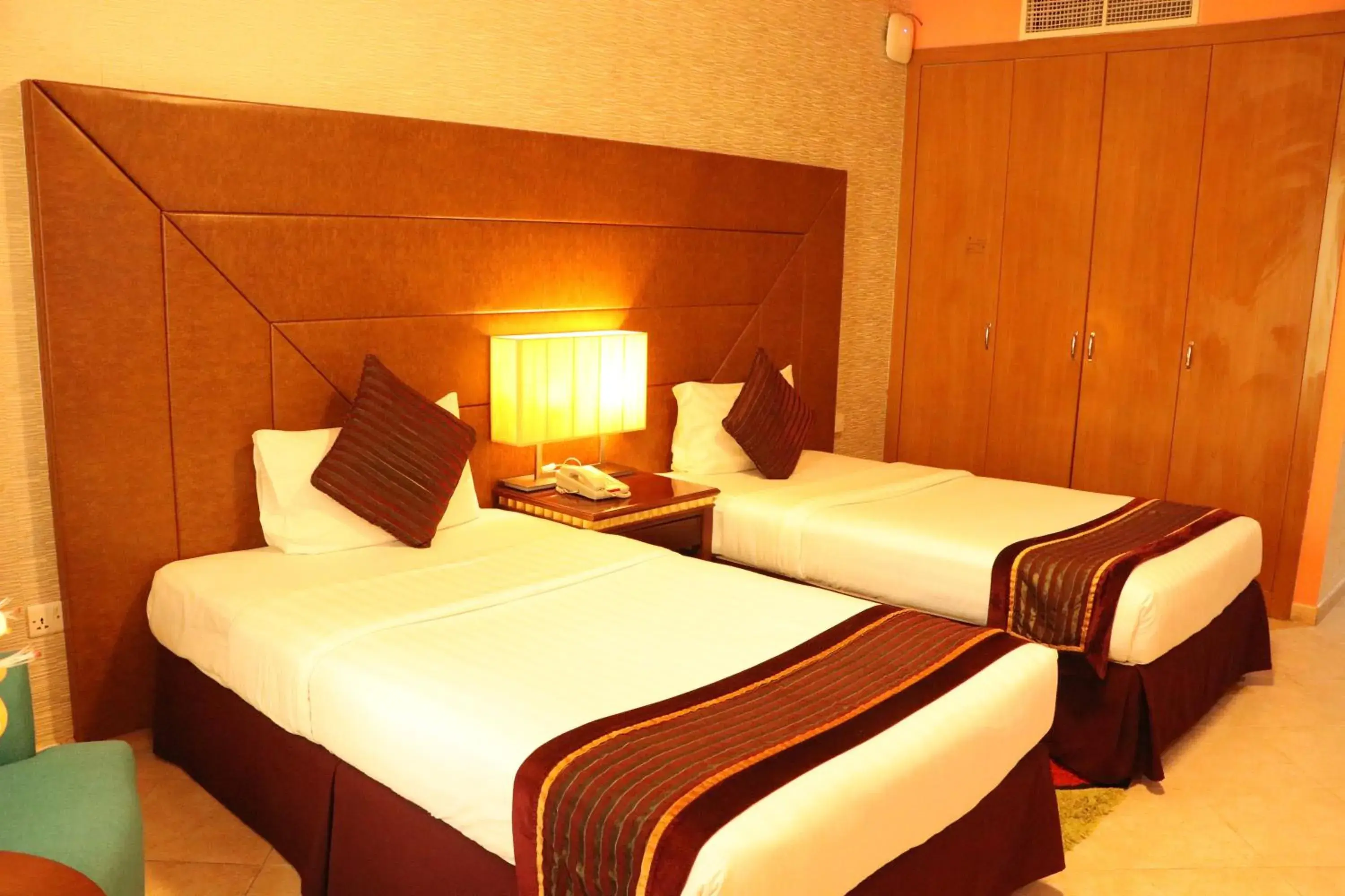 Bed in Al Manar Grand Hotel Apartment