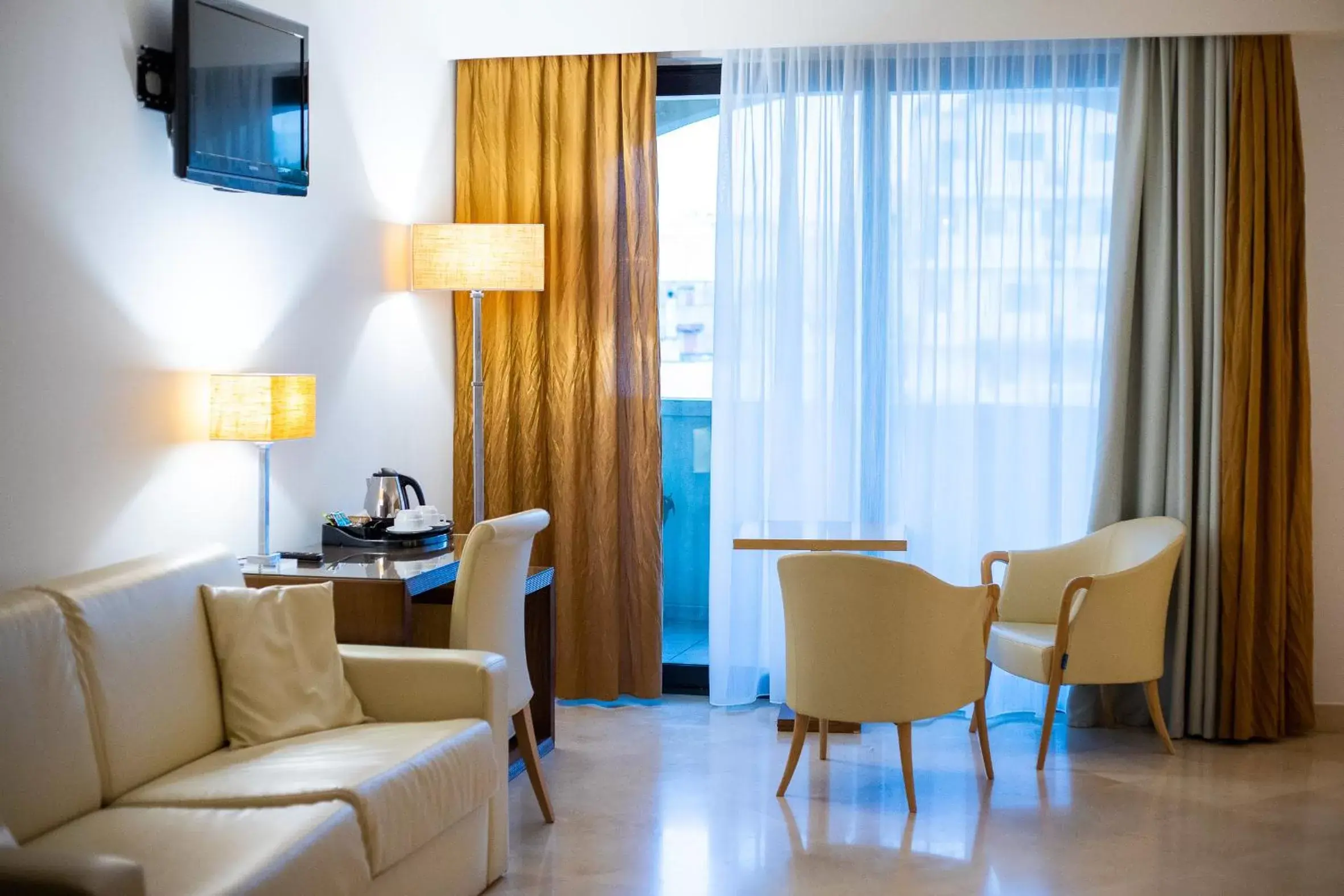 Bedroom, Seating Area in Vittoria Resort Pool & SPA