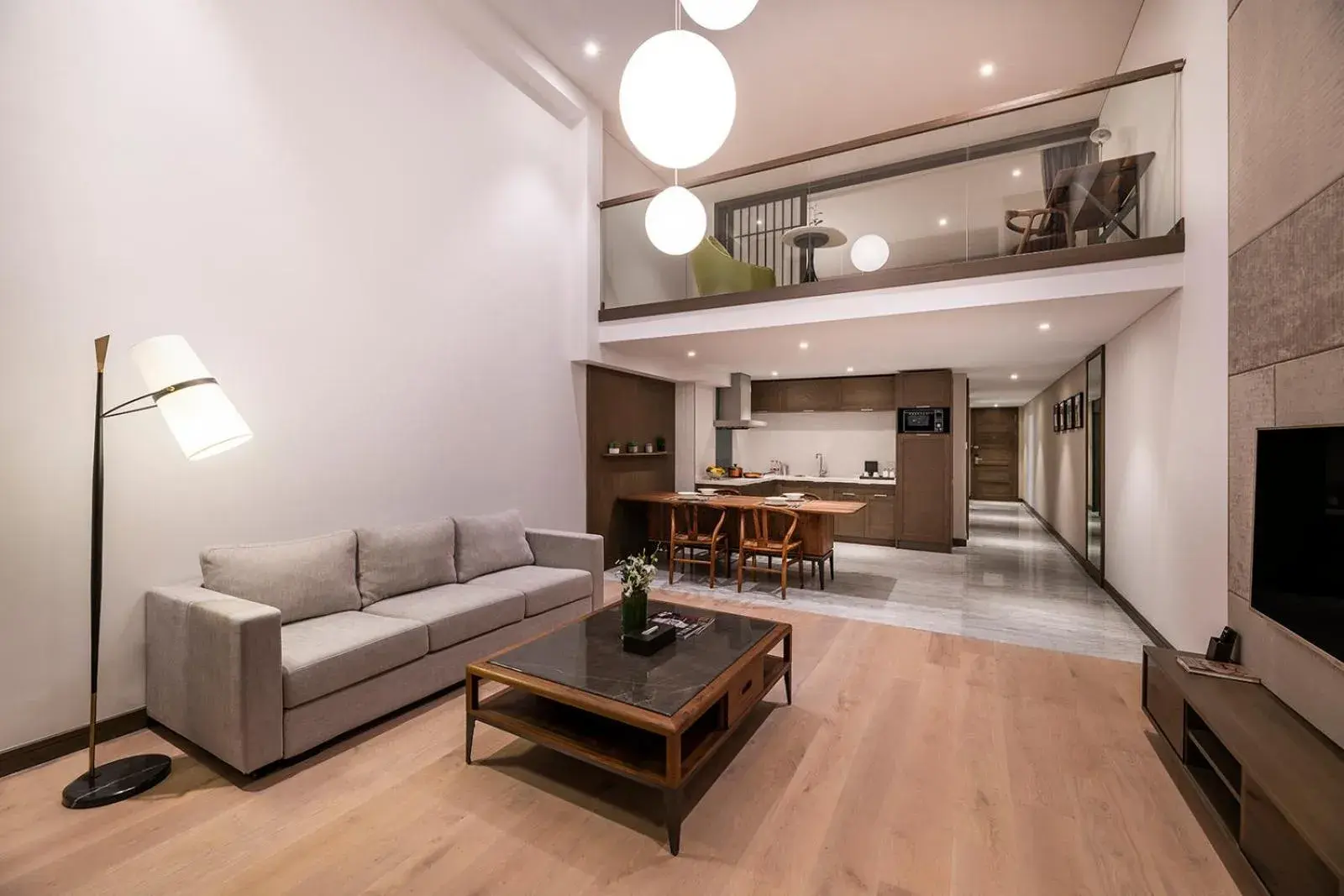 Living room, Seating Area in Novotel Suites Shanghai Hongqiao