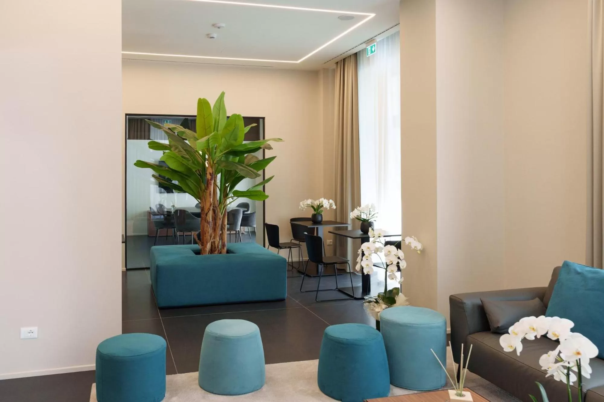 Communal lounge/ TV room in Vi Suites