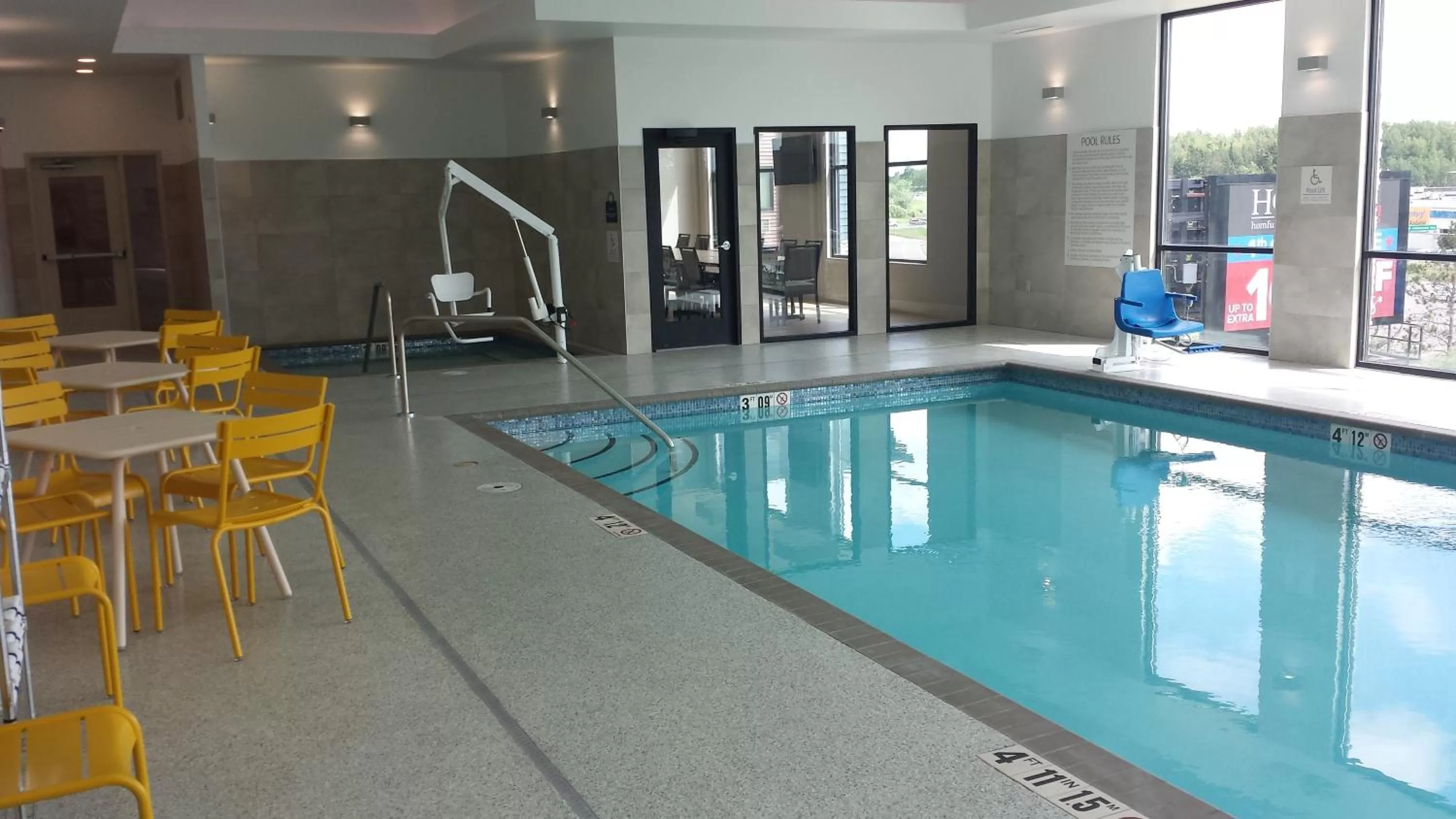 Swimming pool in Days Inn & Suites by Wyndham Duluth by the Mall