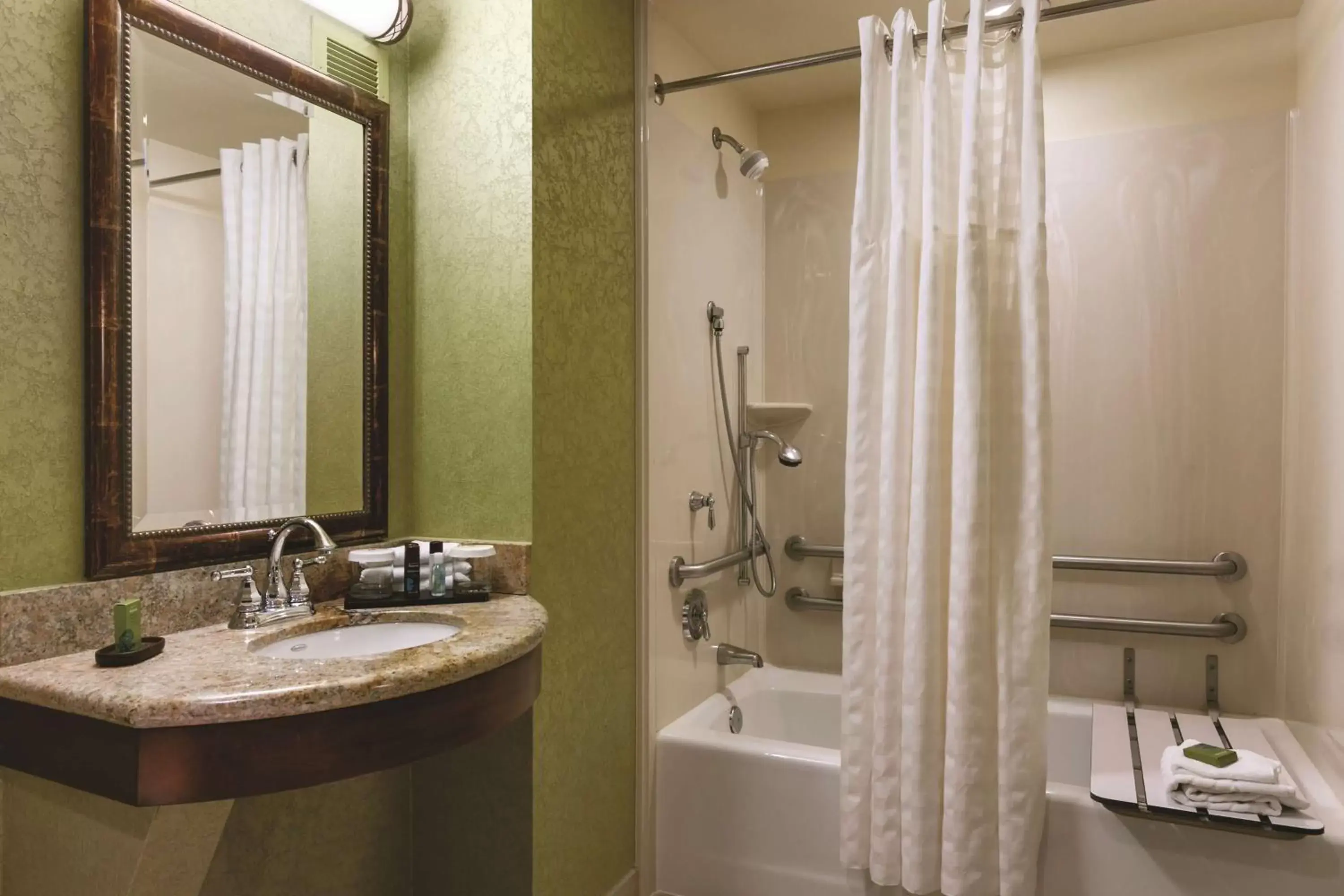 Bathroom in Embassy Suites Omaha- La Vista/ Hotel & Conference Center