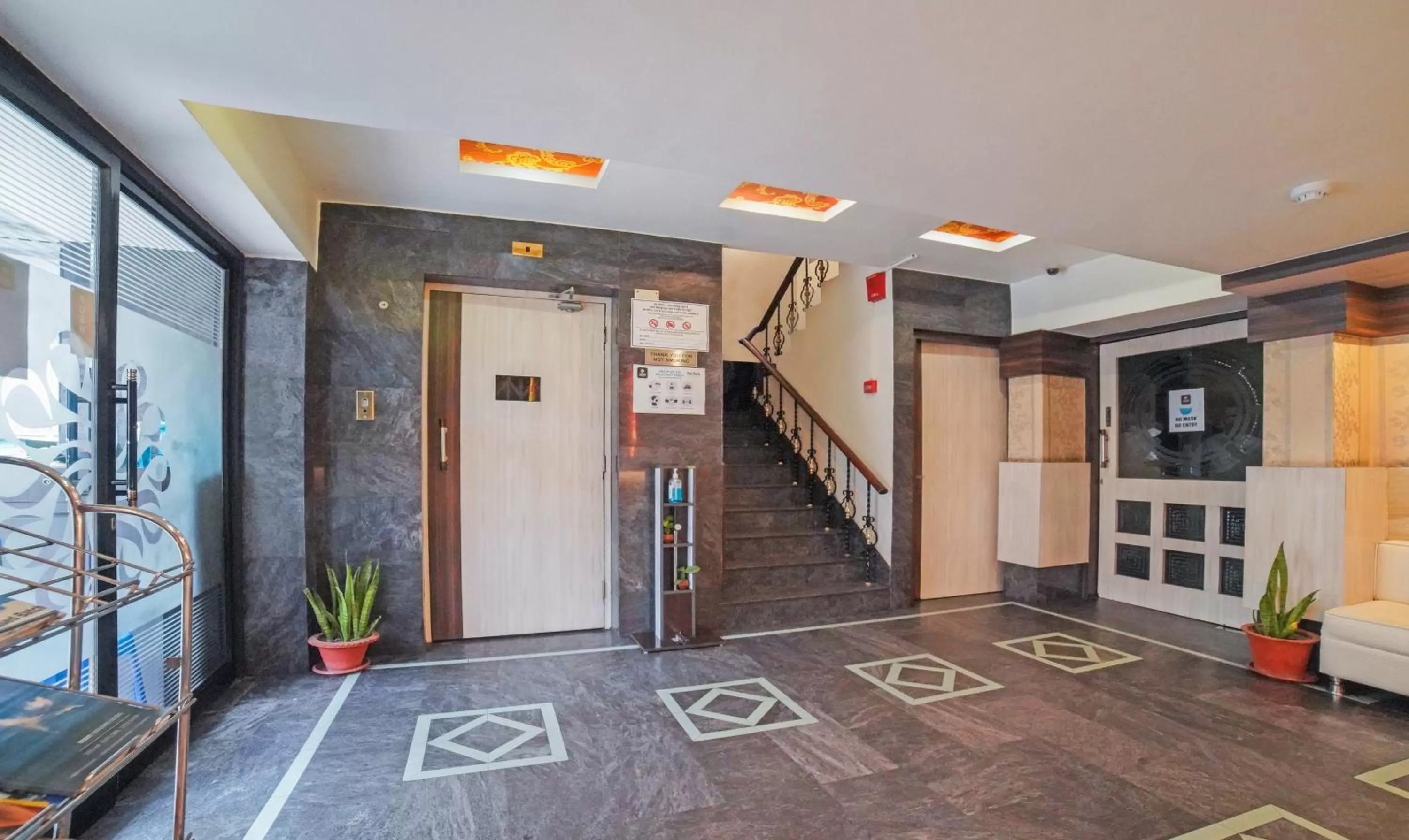 elevator, Lobby/Reception in Treebo Trend South Park Bistupur