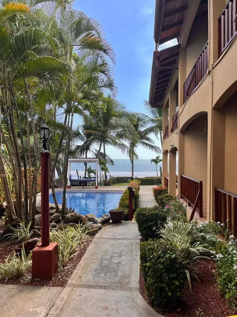 Property building, Swimming Pool in The Backyard Beachfront Hotel