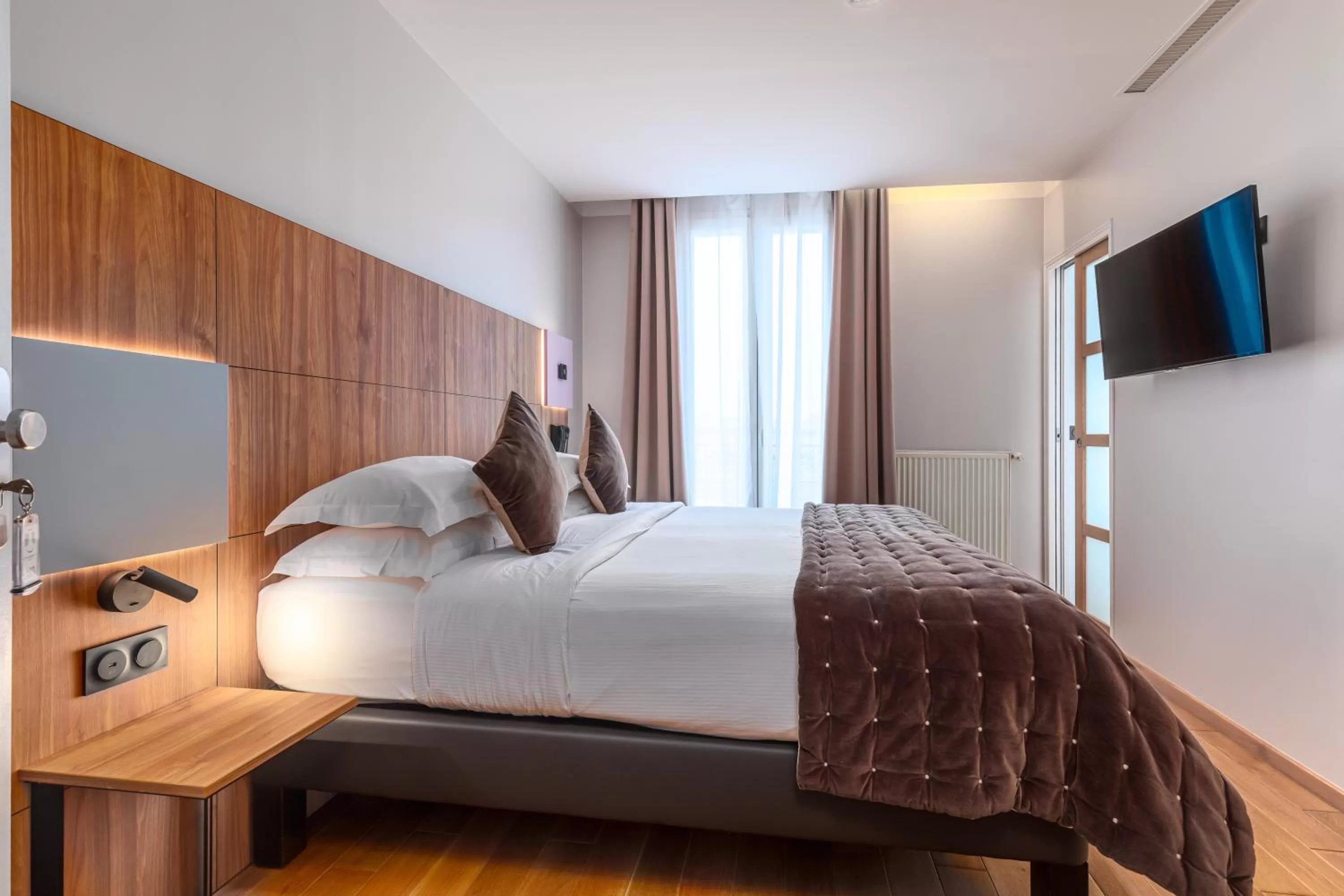 Bed in Hôtel de Bellevue Paris Gare du Nord