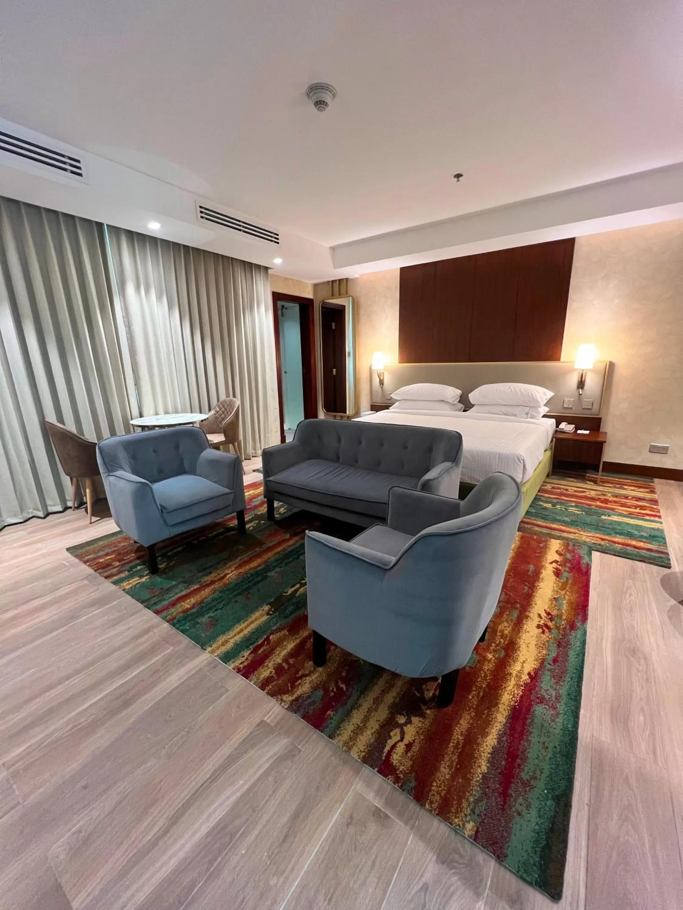 Seating area in City Seasons Suites