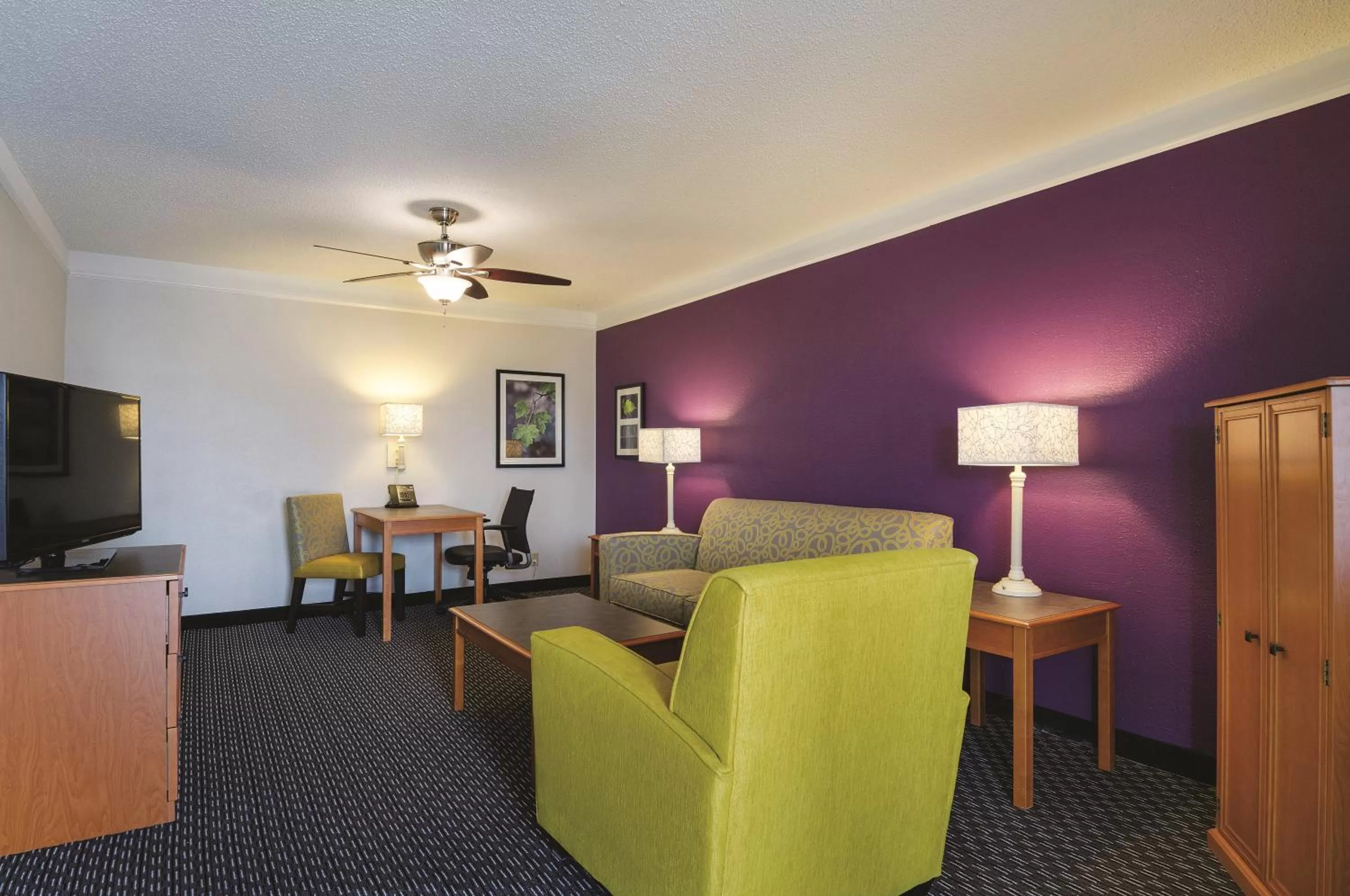 Living room in Baymont by Wyndham Greenville Woodruff Rd