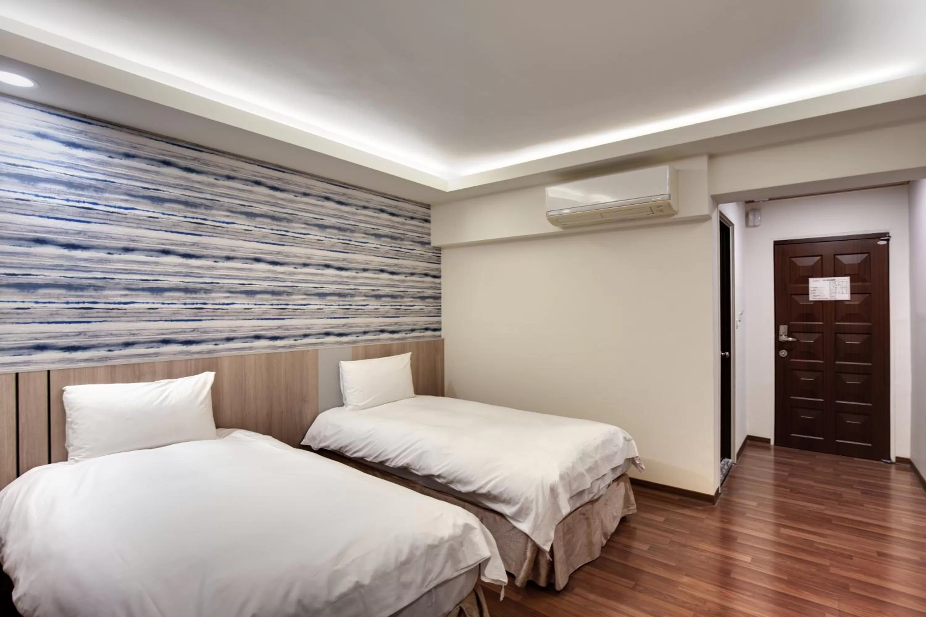 Bed in 天璽商務飯店 Cullinan Hotel